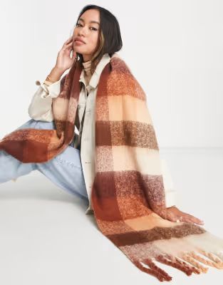 ASOS DESIGN fluffy tassel scarf in brown and camel check | ASOS (Global)