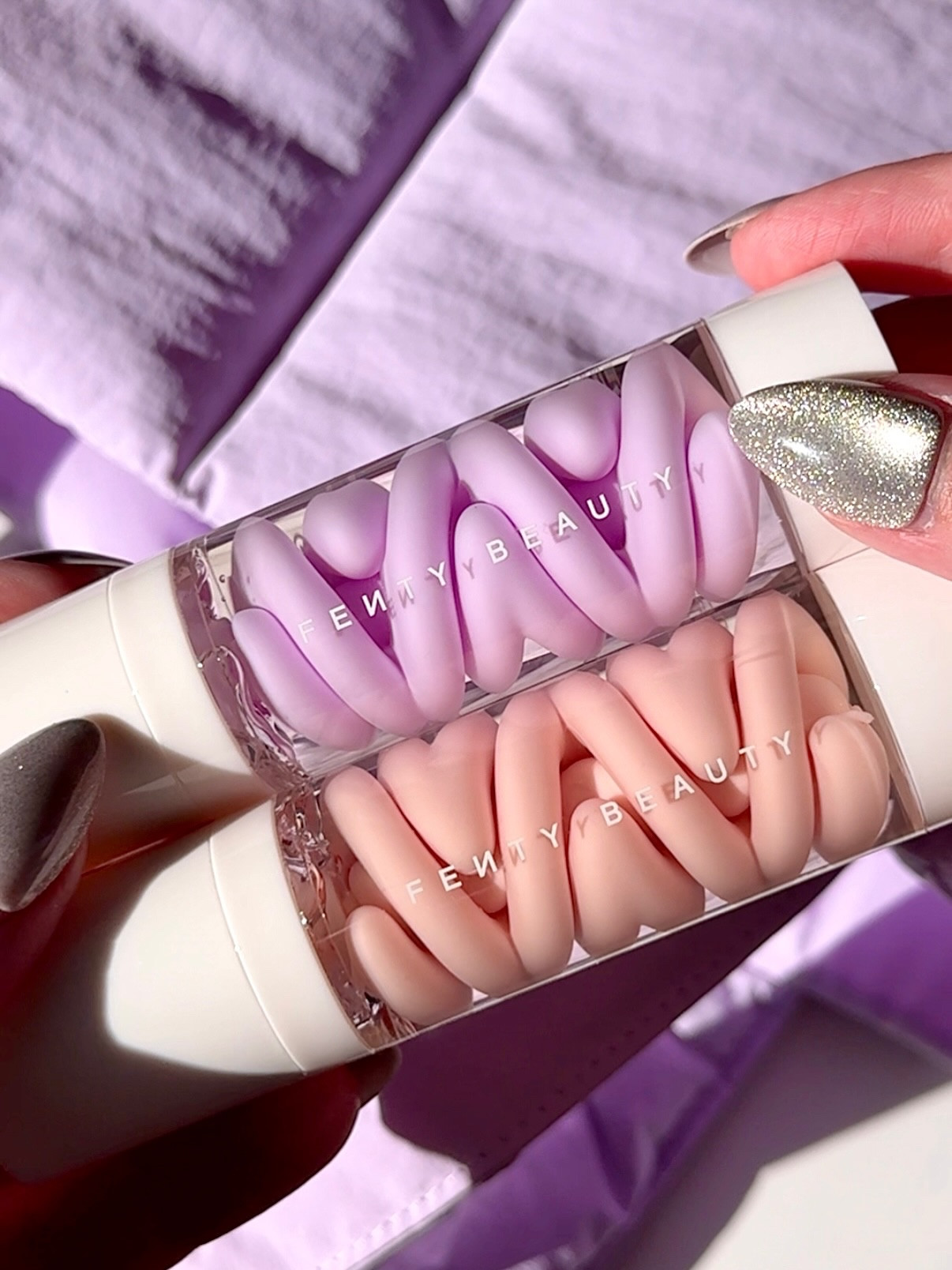 Gifted by @fentybeauty 

Leave it to Fenty to make primer look this good. 🤍✨

The new Fenty Beauty Grip Trip Primers have a swirl design that makes them impossible to resist. I’ve been reaching for the Hydrating + Plumping Primer most days; it gives my skin that soft, bouncy look while the Butterfly Lavender Extract and Maple Sap Extract help it look hydrated and smooth all day. When I want a more matte finish, the Mattifying + Blurring Primer with Chia Seed Extract instantly tones down shine and leaves a blurred, filter-like look.

Both pair perfectly with the Set It Down Powder in Lavender, which gives skin a lightweight, soft-focus finish.

Everything even came with a lavender tote (my favorite color). 💜

Will you be picking up the new Fenty Beauty primers? 

#GripTripPrimer #SetItDownPowder #FentyBeauty #FentyFace #FentyPrimer #SoftFocusFinish #MakeupPrep #MakeupRoutine #MakeupFlatlay #BeautyCommunity #MakeupInspo