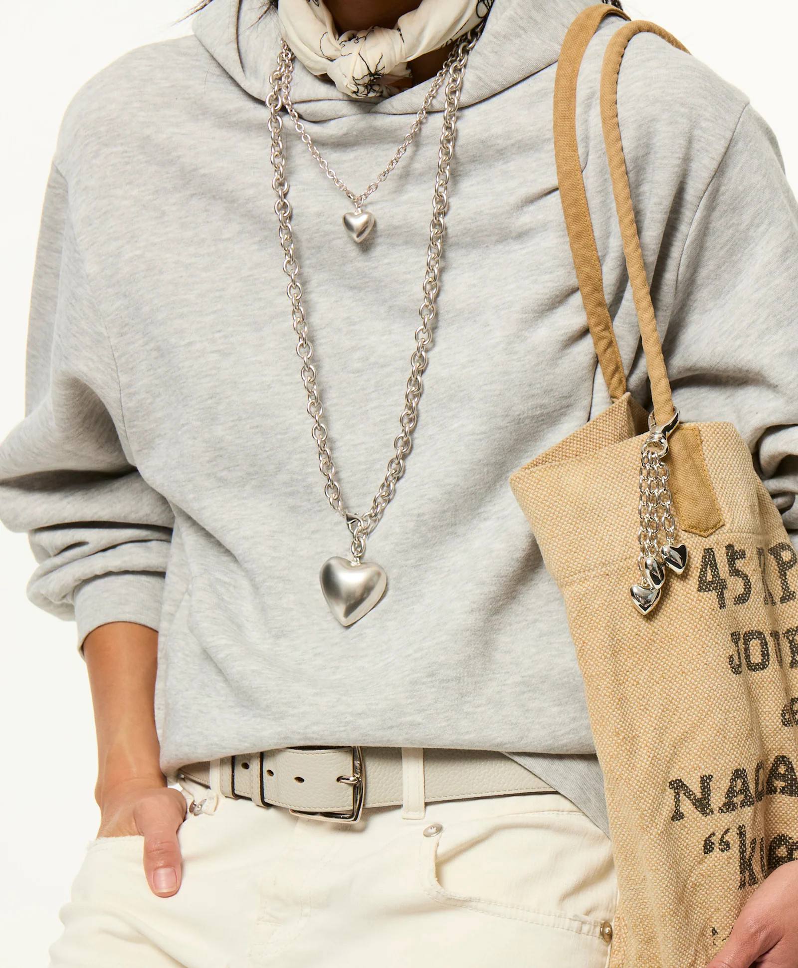 The Mini Puffy Heart Necklace in Silver | Roxanne Assoulin