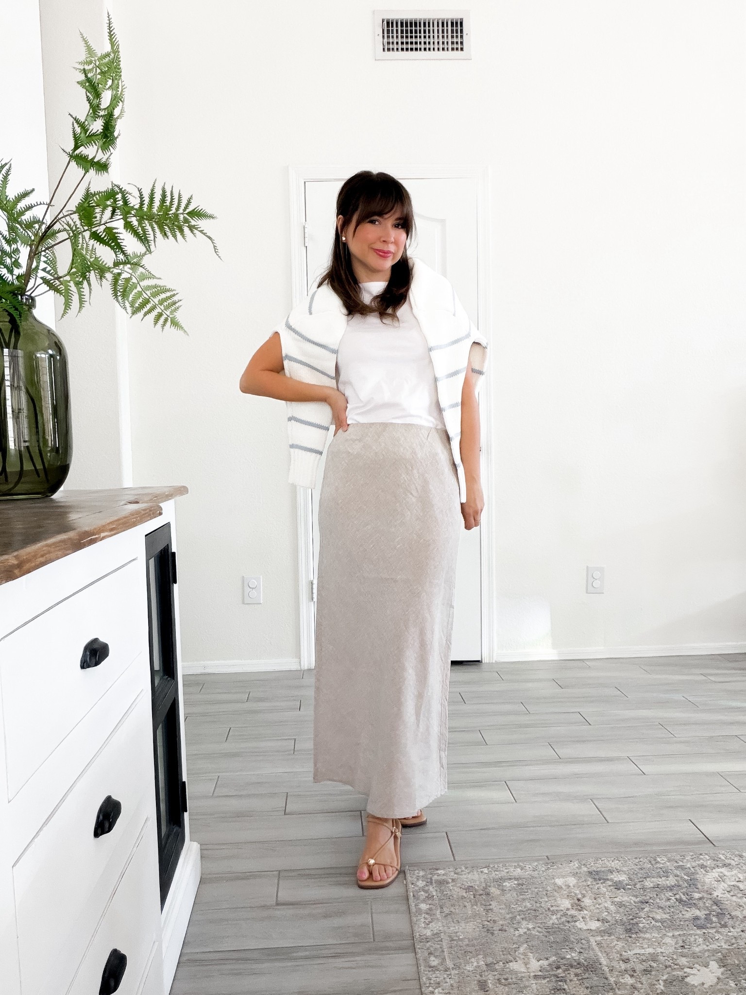 Petite outfit I’ll repeat all spring. Lightweight tee + this linen midi skirt that actually works for 5’2 (no hemming needed). I added a striped sweater over the shoulders for layering and neutral sandals that go with everything. Easy, breathable, and one of those outfits that makes getting dressed simple.

petite outfit ideas, 5’2 style, petite friendly midi skirt, linen skirt outfit, mom outfit ideas, everyday outfit formula, neutral spring outfit, casual chic outfit, effortless mom style#LTKSpringSale

Comment SHOP below to receive a DM with the link to this post on my LTK ⬇ https://liketk.it/5XOuW #ltkootd #ltkpetite @Quince 