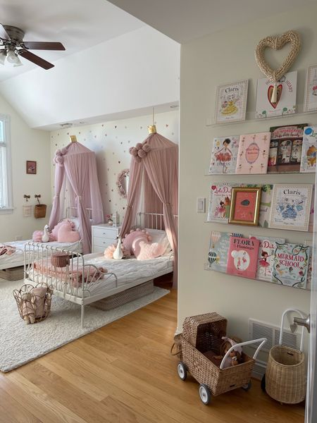 My girls’ shared bedroom 💗 all the details are on the Blog too! 

Kids room, girls room, canopy, pink, pink room, shelves, books, kids books, kids bed, kids room, kids bedroom, girls bedroom, shared bedroom, storage, basket, amazon home, amazon find, amazon, rug, area rug, baskets, barbie, dolls, bows, mirror, 

#LTKGiftGuide #LTKFind #LTKkids