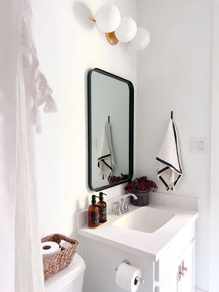 Love these modern vanity light

Mid century modern / modern bathroom / vanity mirror / brass vanity light / organic modern / black vanity mirror /

#LTKstyletip #LTKsalealert #LTKhome