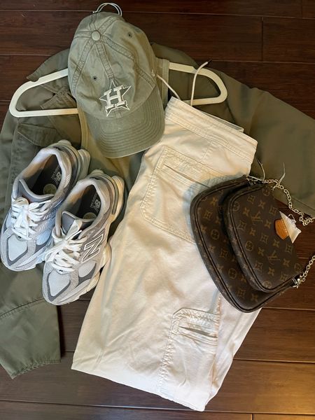 Comfy and casual spring airport outfit idea 
Tank: small
Jacket: small
Cargo pants: 4 short 
New balance 9060 sneakers: 4.5 men 
Lv multi pochette 
Baseball cap 

#LTKSeasonal #LTKstyletip #LTKfindsunder100