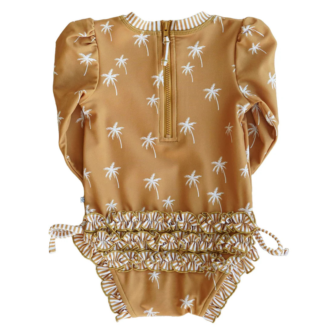 Long Sleeve Rash Guard With Ruffle Bottom | Island Vibes | Caden Lane