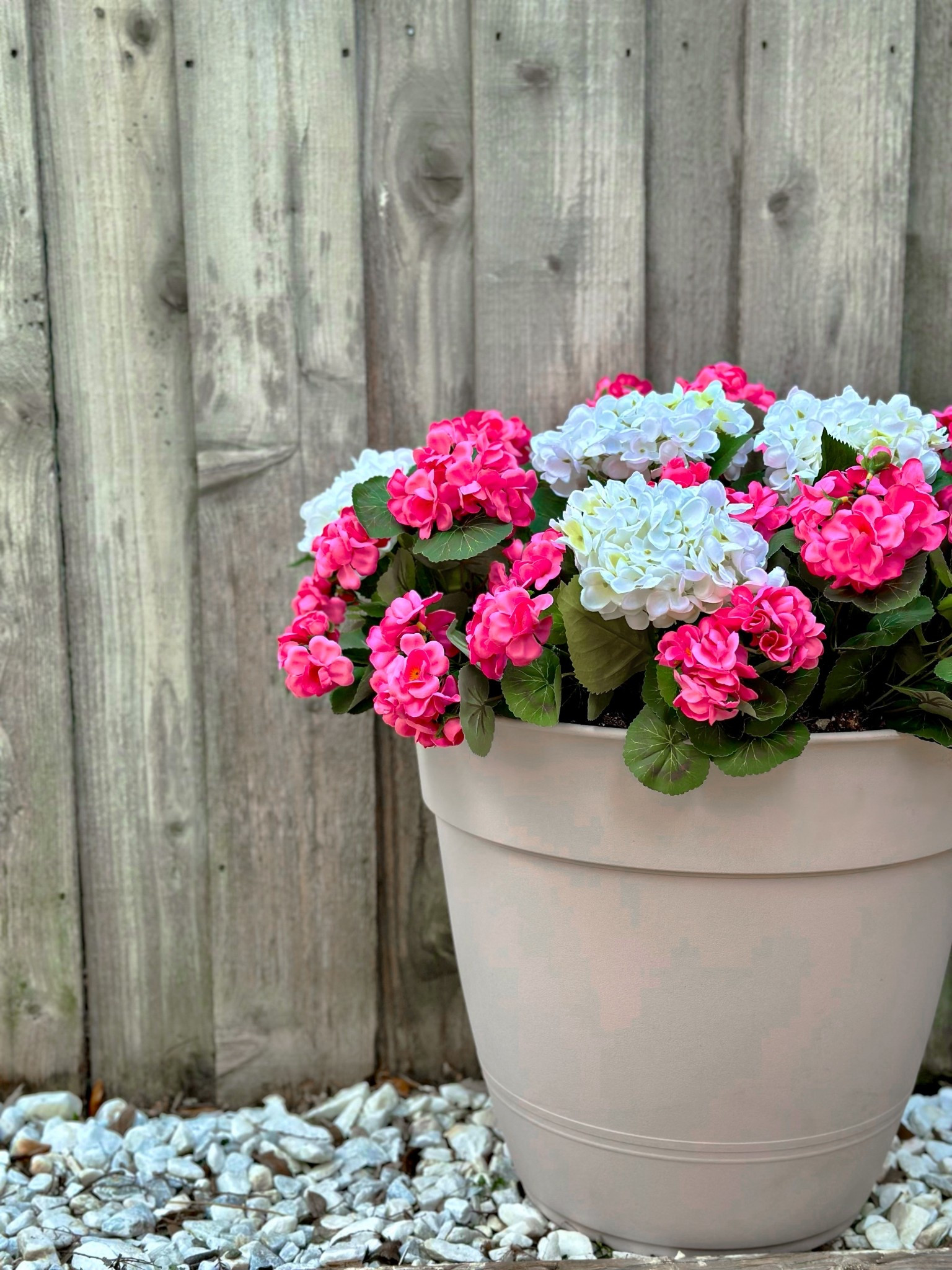 Added a pop of color to my backyard with this cheerful combo of faux hydrangeas and geraniums! Love how easy it was to style this neutral planter—instant curb appeal, zero maintenance.

#LTKHome #OutdoorDecor #SpringPorch #CurbAppeal #FauxFlowers


#LTKHome