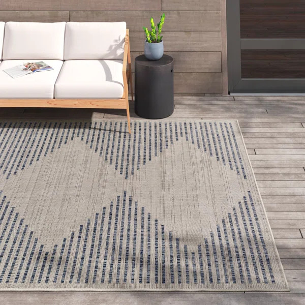Calliah Striped Polypropylene Area Rug in Blue/Cream | Wayfair North America