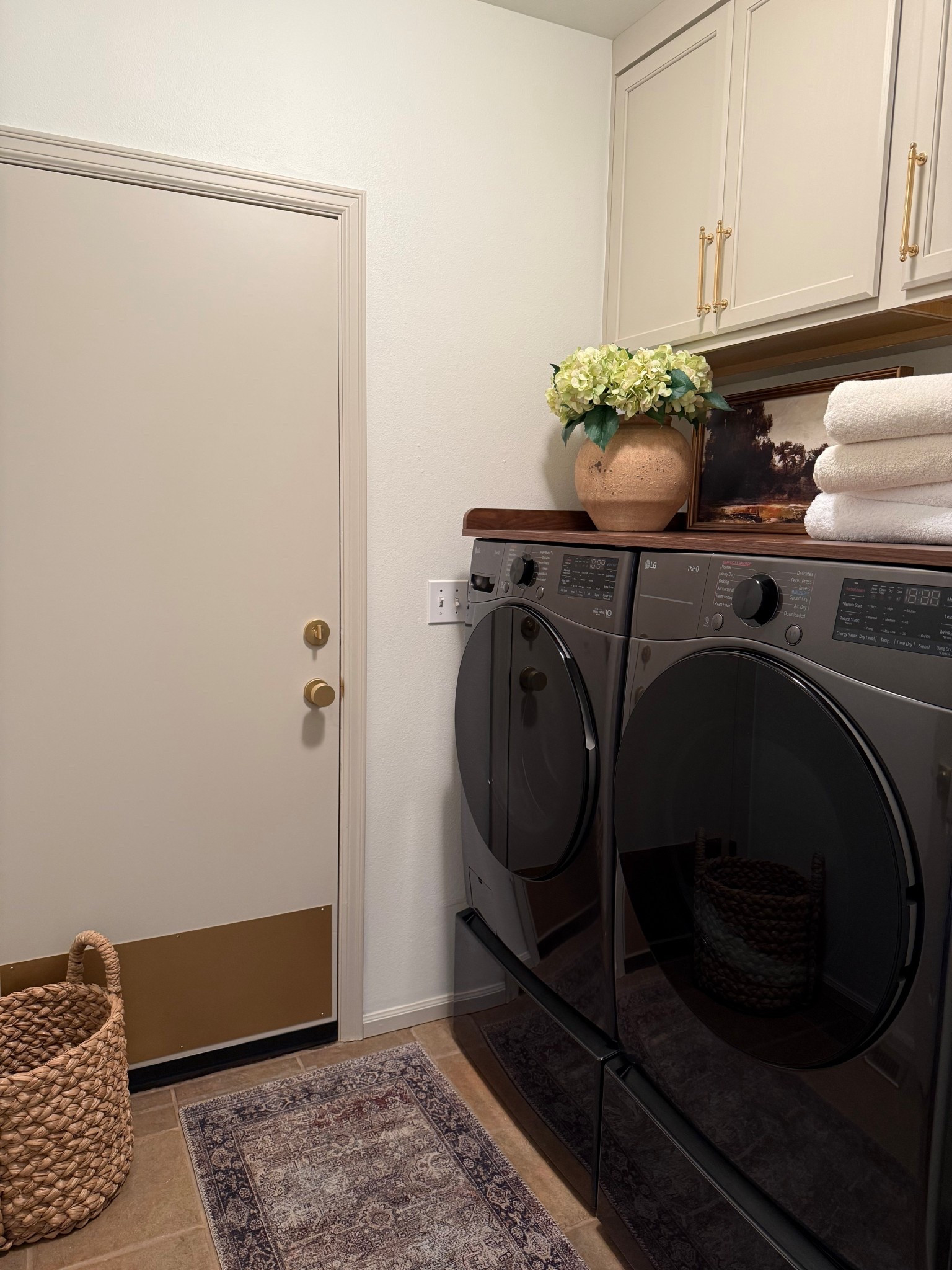 Small Laundry Room. Laundry Room Makeover. Laundry Room Cabinets. Laundry Room Decor. Laundry Room Styling. Laundry Room Countertop. Laundry Room Cabinet Hardware. Door Hardware. Brass Door Hardware. Satin Brass Knobs. Entry Door Set. Accessible Beige Sherwin-Williams. Painted Interior Doors. 90s Home Refresh. Garage Entryway Ideas. Functional Laundry Room. Small Space Organization. DIY Home Renovation. Modern Traditional Home. Entryway Styling. Utility Room Design. Viaggo Hardware. Circolo Rosette. Interior Door Upgrade. Home Improvement.

#LTKhome