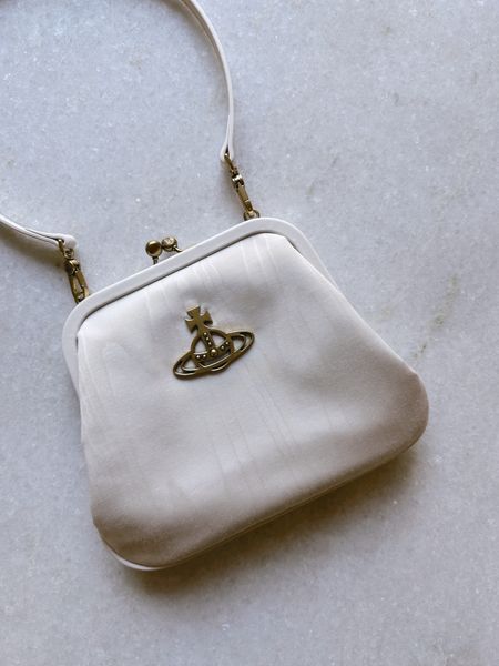 VIVIENNE WESTWOOD Vivienne's moiré tote bag, white designer bag, spring / summer, neutrals, gold, handbag, purse

#LTKstyletip #LTKSeasonal #LTKitbag