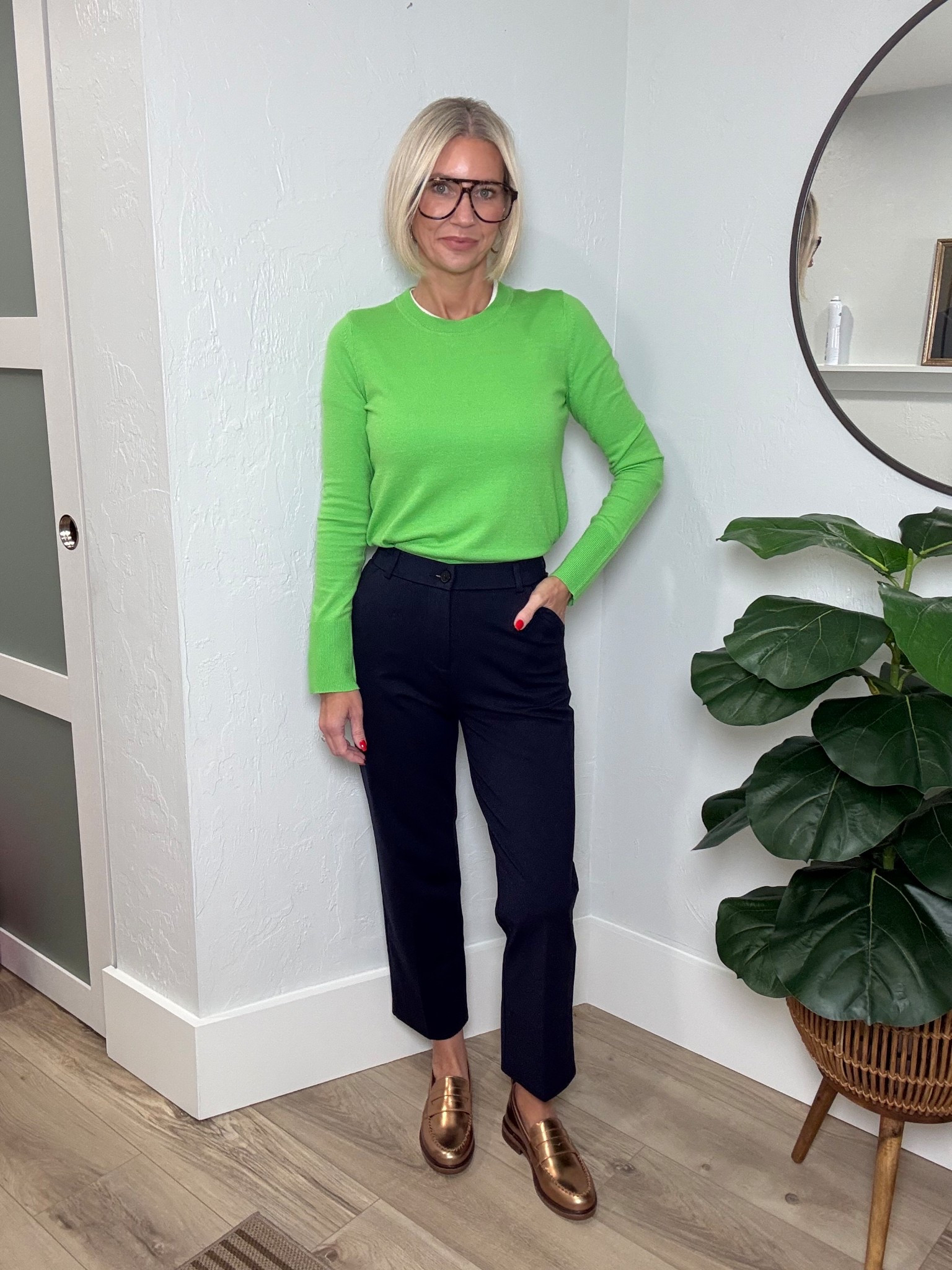 I totally didn’t mean to wear Seahawks colors, but I’m not made about it! 

Sweater from Free Assembly at Walmart. I’m wearing a small. It’s a lightweight material that’s perfect for layering. I have a white tee underneath for the layered collar look. 
My pants are from Amazon. I’m wearing a size 2 and they fit tts. They have lots of stretch but still hold their shape. They’re a really nice quality work pant option! Available in other colors as well. 

#LTKWorkwear #LTKOver40 #LTKootd