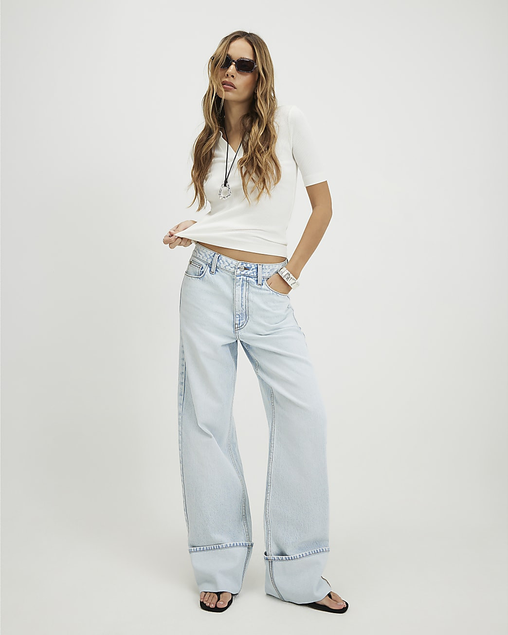 Blue Relaxed Straight Turn Up Hem Jeans | River Island UK & IE