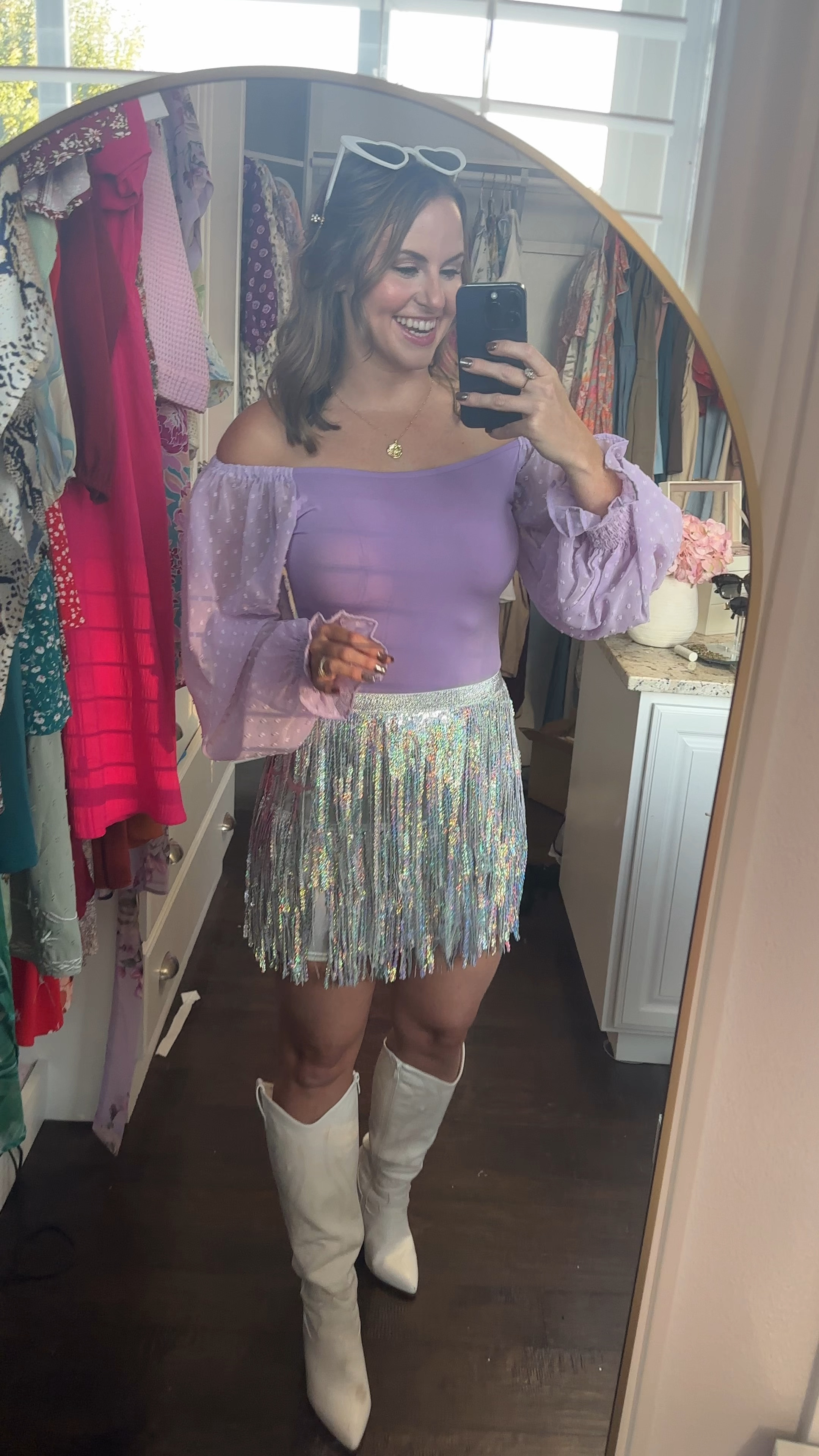 Fun concert outfit, party dress or Vegas outfit! This sequin fringe skirt is SO adorable! It’s stretchy and also has a zipper in the back. It’s high waisted and has elastic waist band. Paired it with this black top that gives the look of a bodysuit, white cowboy boots, heart sunglasses & sparkly hair clips. 

Eras tour outfit, Meghan trainor concert outfit, Taylor swift outfit , Halloween costume, fall outfit, Las Vegas dress , fringe skirt 

⬇ https://liketk.it/4TEuj #ltkstyletip #ltkvideo

⬇ https://liketk.it/4TEwY #ltkstyletip #ltkparties #ltkfindsunder50