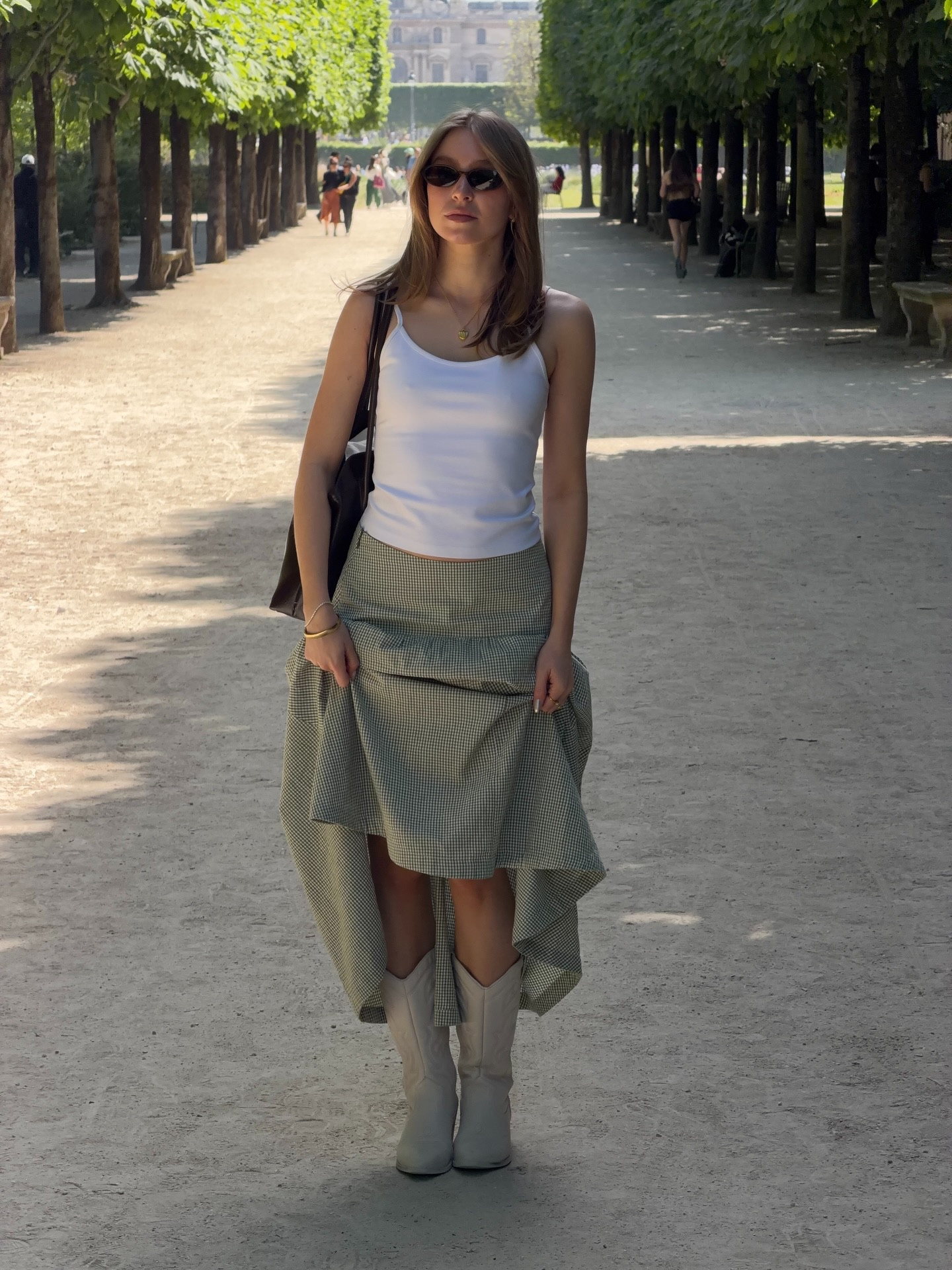 the maxi skirts and cowboy boots combo 🤠