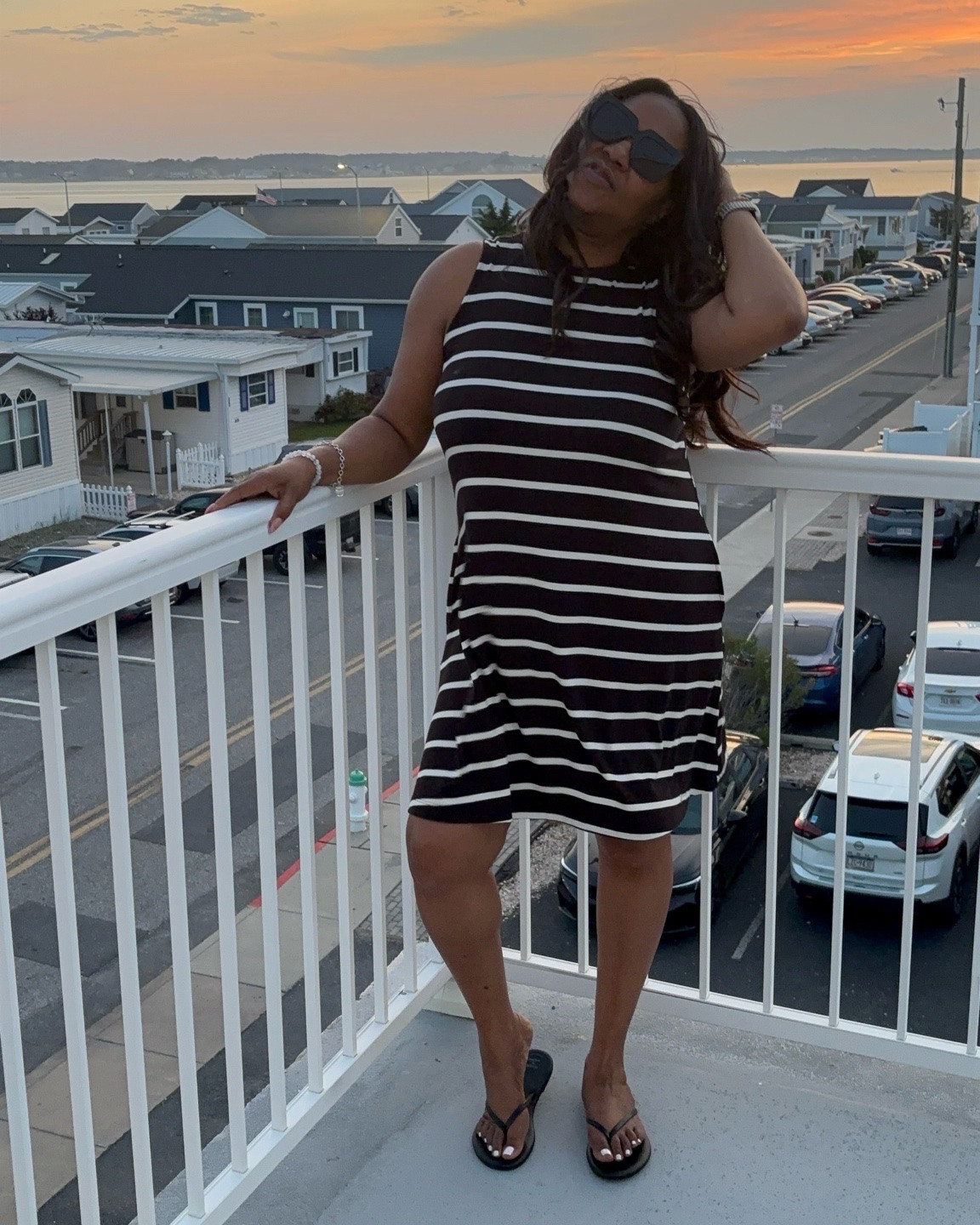 This may be my favorite easy summer outfit yet. ☀️🖤

The striped swing dress is lightweight, comfortable, and flattering without feeling clingy. I paired it with simple black flip flops and oversized sunnies for an effortless look that works for errands, vacation, brunch, or a casual weekend out.

And can we talk about the prices? The dress is under $20 and the flip flops are under $10. 🙌🏾

Tap to shop the full look and follow me on LTK for more affordable fashion finds, everyday style, and pieces that make getting dressed easy. ✨

#LTKootd #LTKMidsize #LTKgrwm