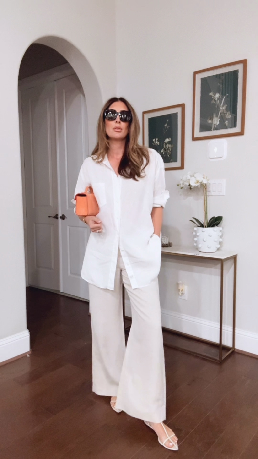 My exact shirt is the Frank & Eileen one, exact sandals are Jil Sander. Linked similar options at lower price points to get the same look  