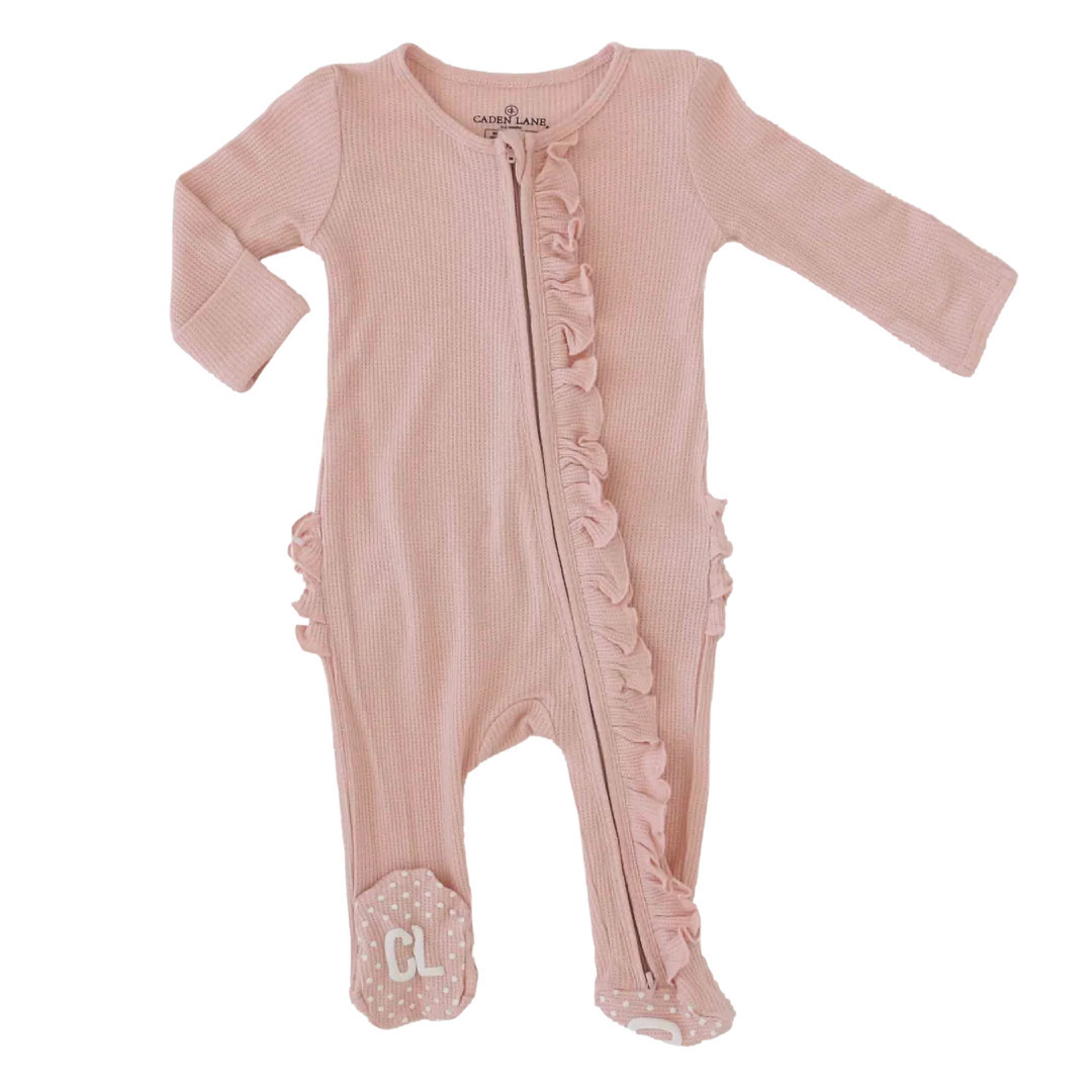 Lovely Pink Waffle Bamboo Zipper Ruffle Footie | Caden Lane