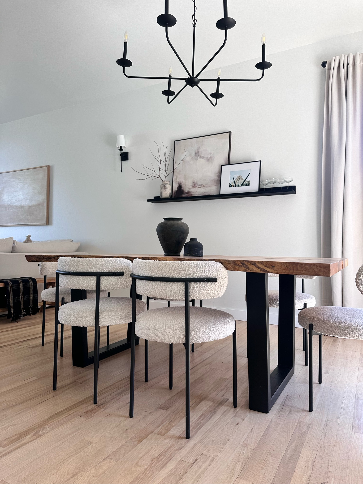Ding room table decor, decor inspo, love edge table, boucle chair , dining chair, aesthetic chair, wall art, neutral art, curtains, blackout curtain, beige curtain , sconce , black chandelier 