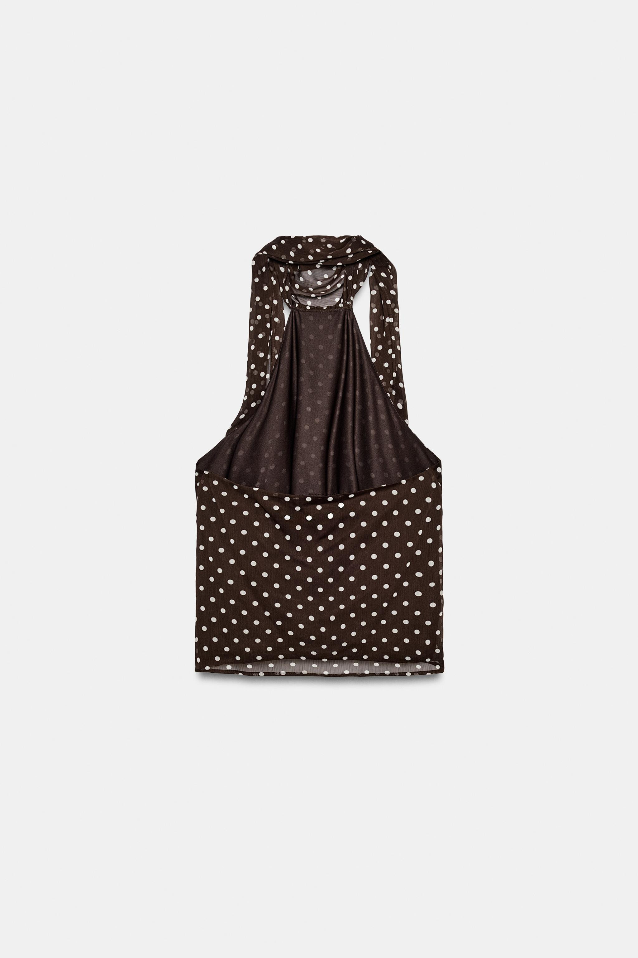 Halter neck top with ruffles and open back. Back hidden button closure. | Zara US