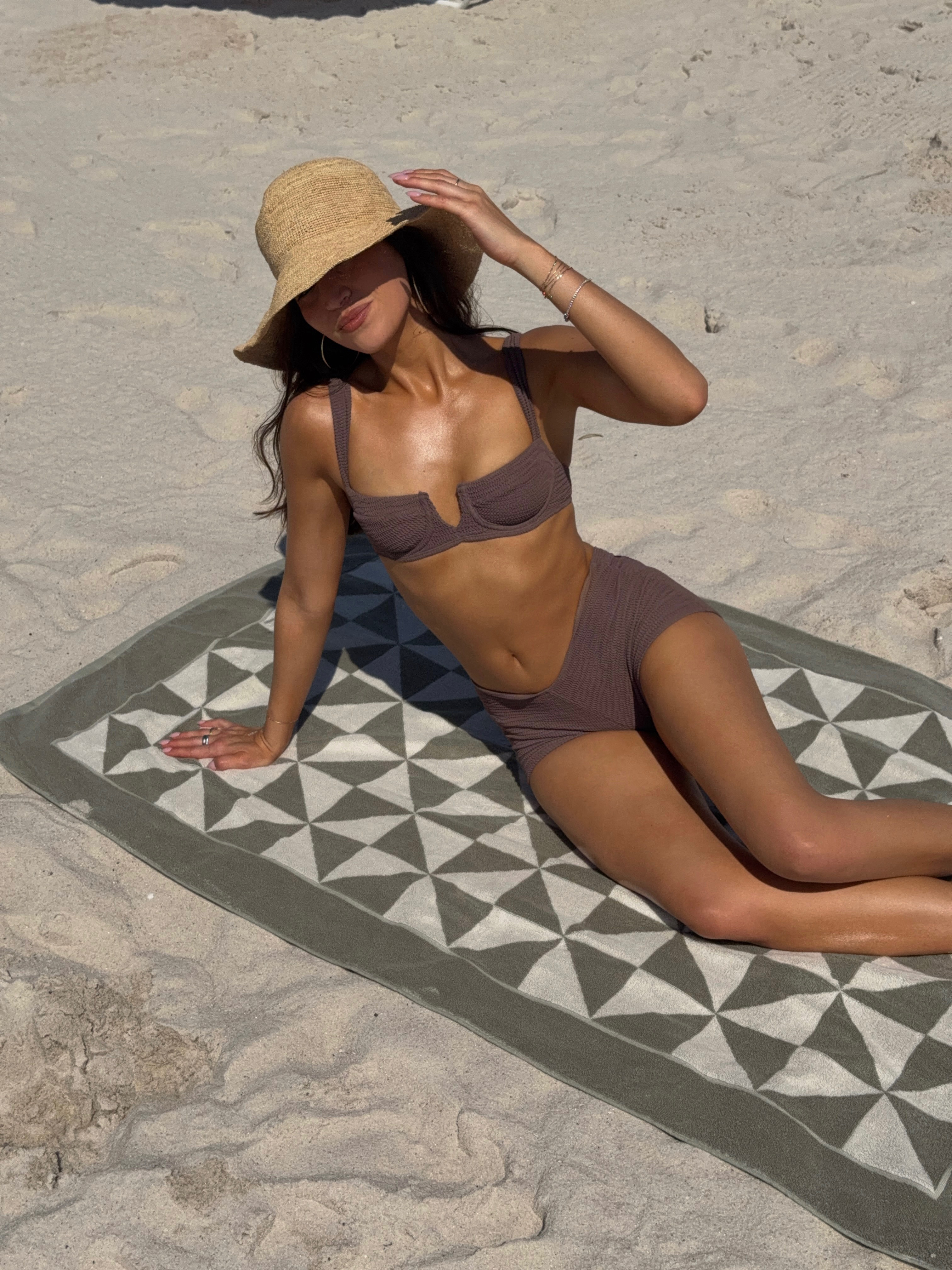 Vacation uniform 🌞 Stone crinkle suit + matching shorts, raffia hat, and the softest 100% absorbent beach towel for slow beach days. 

 

#LTKootd #LTKSwim #LTKTravel