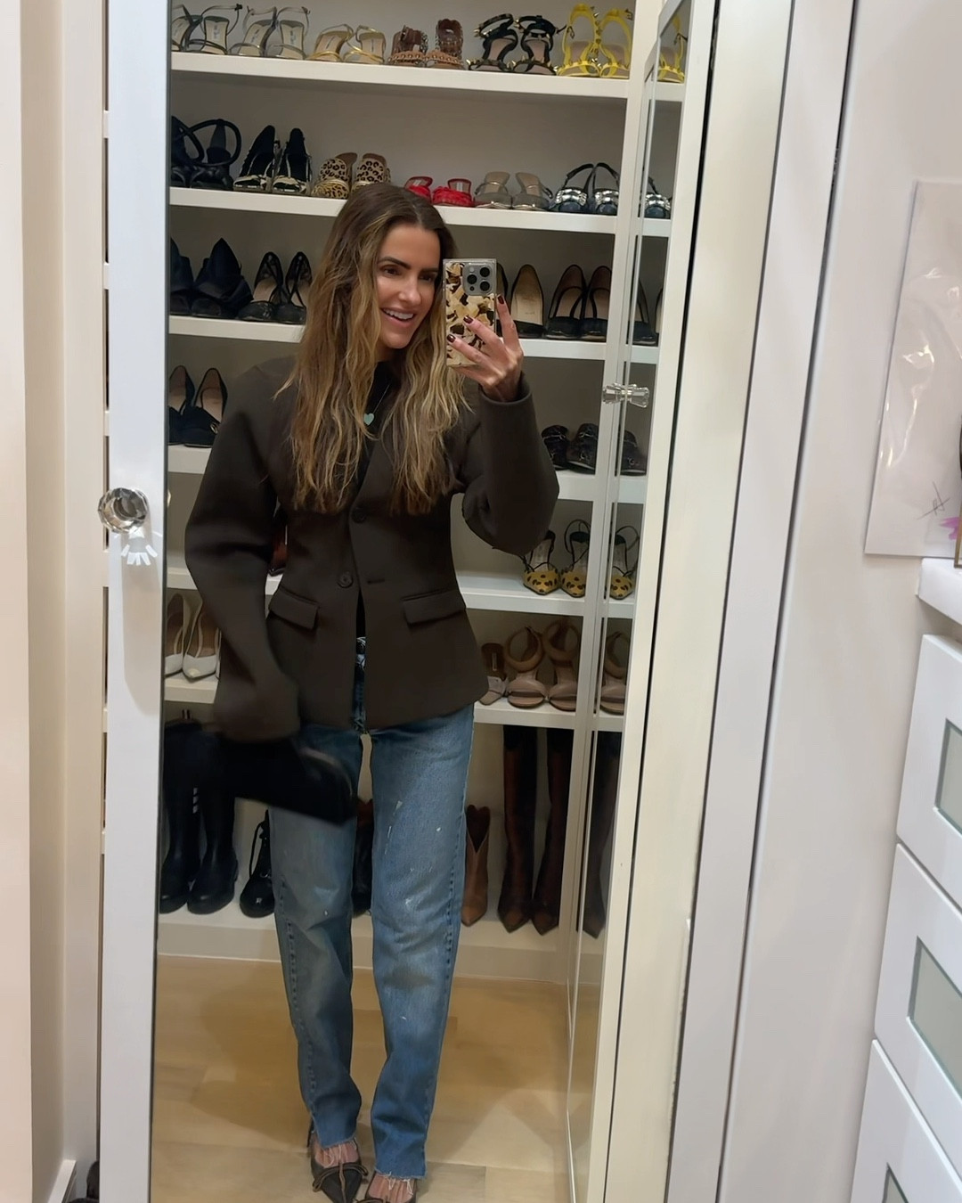 saturday night date night off to one of our favs @saintmartinswinebar 

wearing my vintage levi’s & new favorite brand of blazers!! 

you guys the quality of this brand is incredible & the price is so good!! 

i own like 3 now ill link all my favs below. they run tts i’m wearing an x-small 

& this gorg knit top (that’s lil see thru with my pretty black bra) that i also linked 

+ these fab heels & bag too! 

+ shop rest of my look below too! 

#LTKootd #LTKWorkwear #LTKOver40