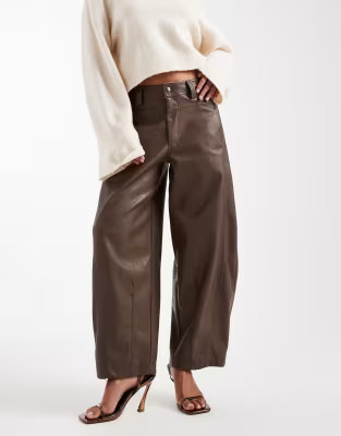 ASOS DESIGN Petite faux leather barrel leg trousers with seam detail in brown | ASOS (Global)