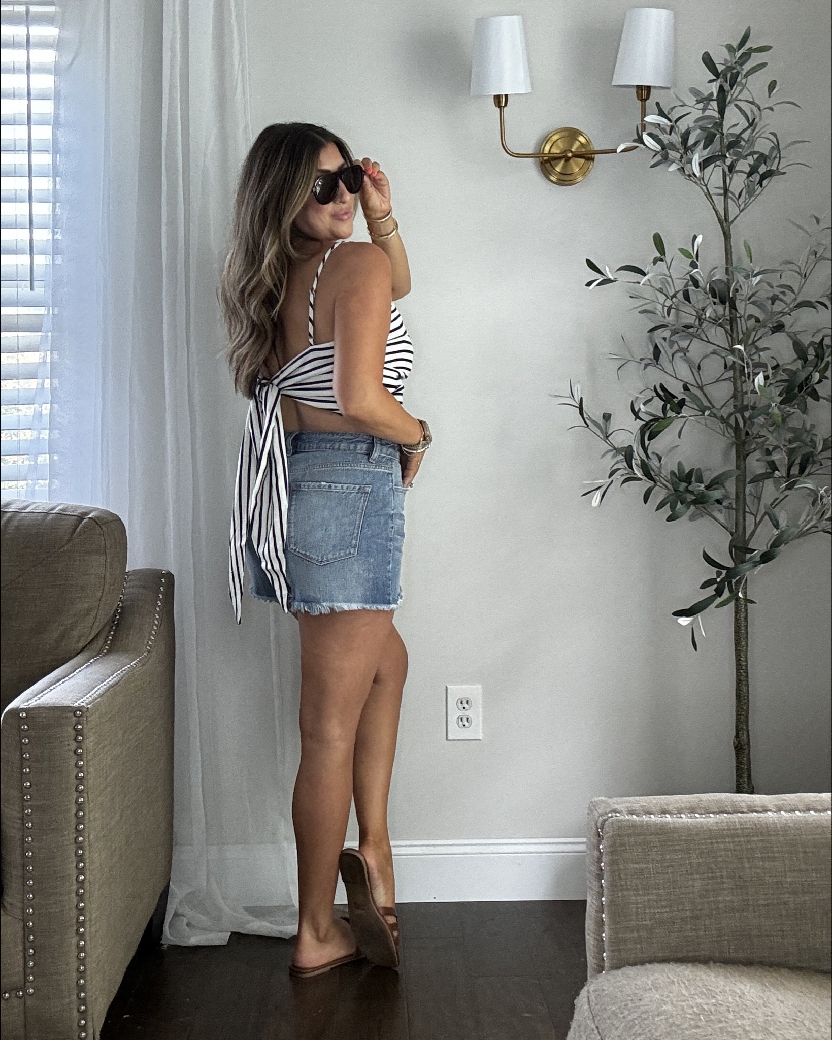 The cutest wrap striped top! Wearing a med but could have sized down. You can tie as tight or as loose as you want! Wearing tts in jeans and shorts. Use my code LAURENHBLOOM20 for 20% OFF! 

summer outfit, vacation style, casual outfit idea 

#LTKTravel #LTKFindsUnder50 #LTKStyleTip