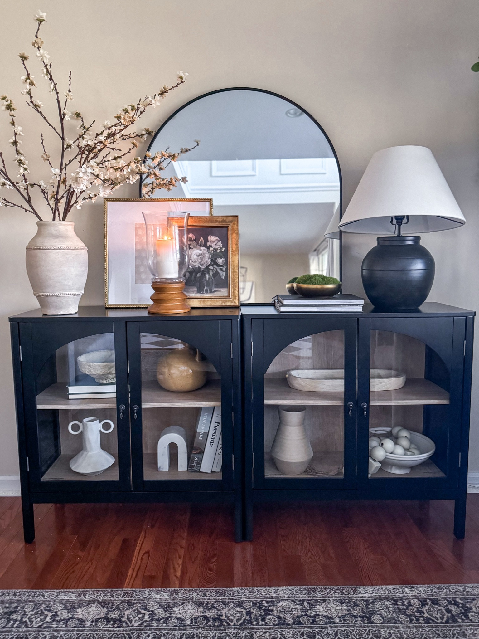 Cabinet styling 
Spring 
Cherry blossom 
Arched cabinet

#LTKhome #LTKsalealert