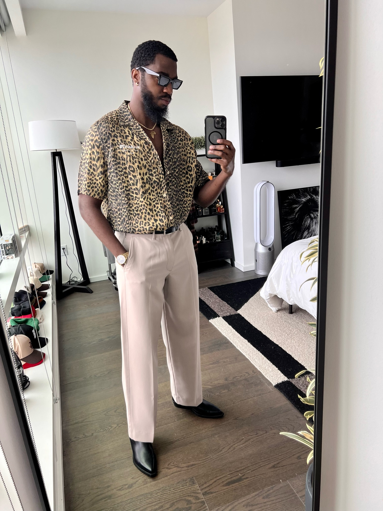 Cheetah print shirt and a pair of baggy trousers w/ boots that would be great for a evening dinner on vacation. Links to items down below ⬇️!

#LTKmens