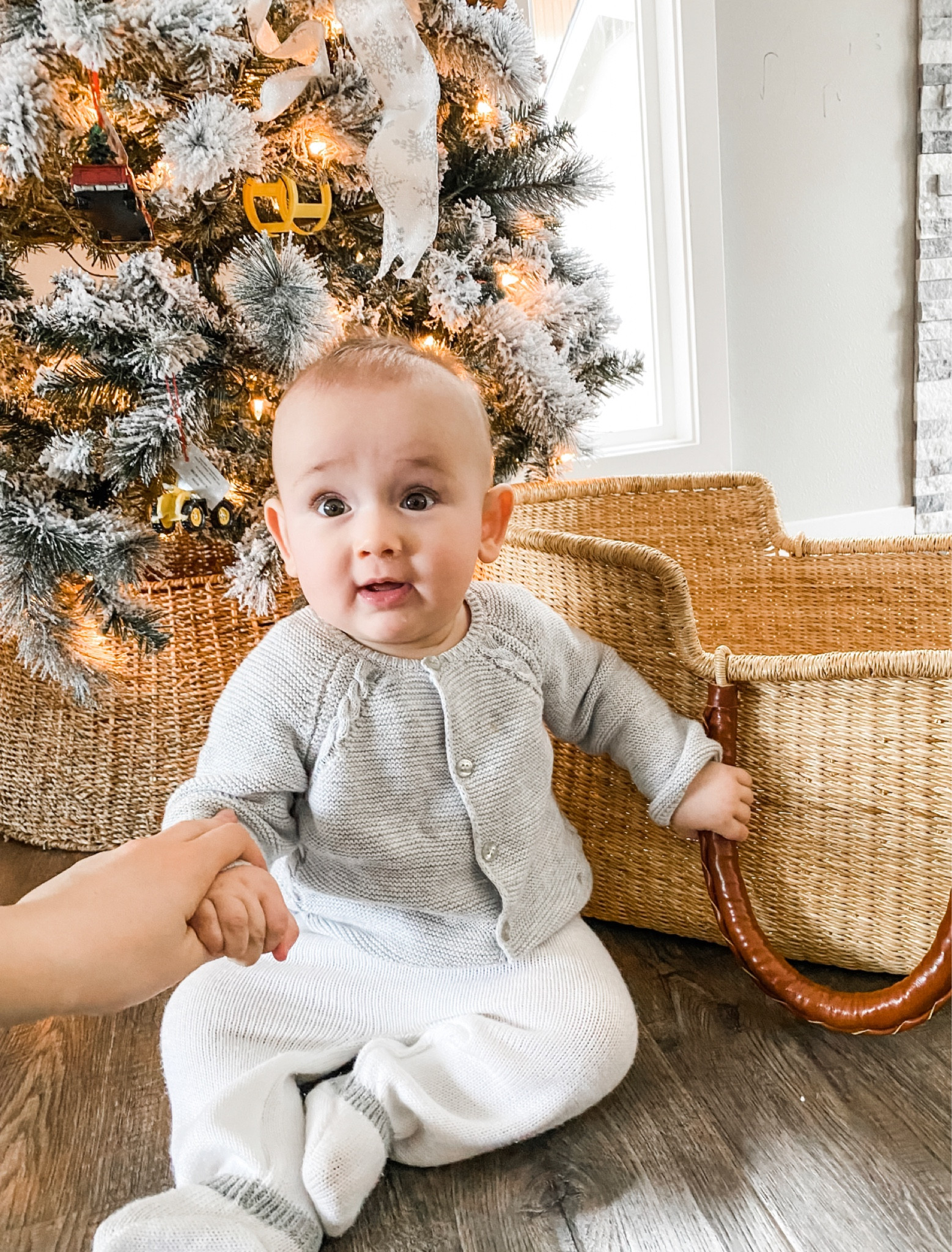 Sweet Christmas baby photos with all our warm cozy knits and the cutest bassinet ever! Shop love dua woven basket bassinet with leather trim handles is such a beautiful peace in our home. Matches our woven tree skirt. Baby boy winter style. 

#LTKHoliday #LTKbaby #LTKbump