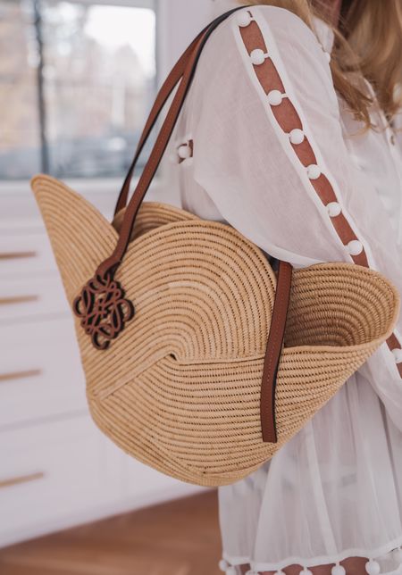 This stunning Loewe woven tote bag is so chic and perfect for your next beach vacation! 

~Erin xo 

#LTKitbag #LTKSeasonal