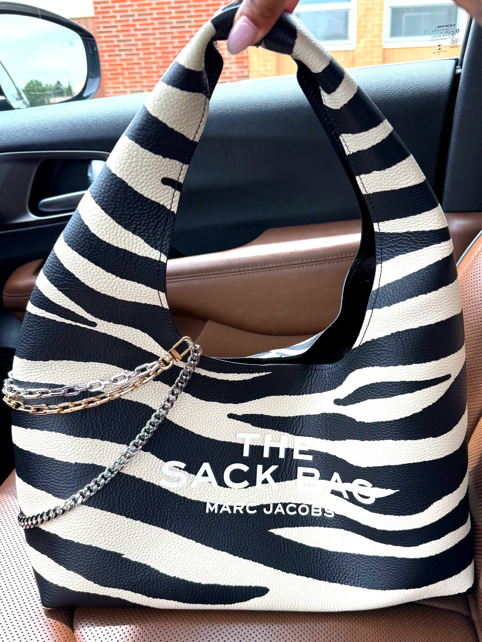 Such a good neutral, and adds so much to any looks 🦓

Note the sack bags come in different sizes, the zebra bag is the XL Sack bag. 

#LTKSummerEdit #LTKStyleTip #LTKItBag