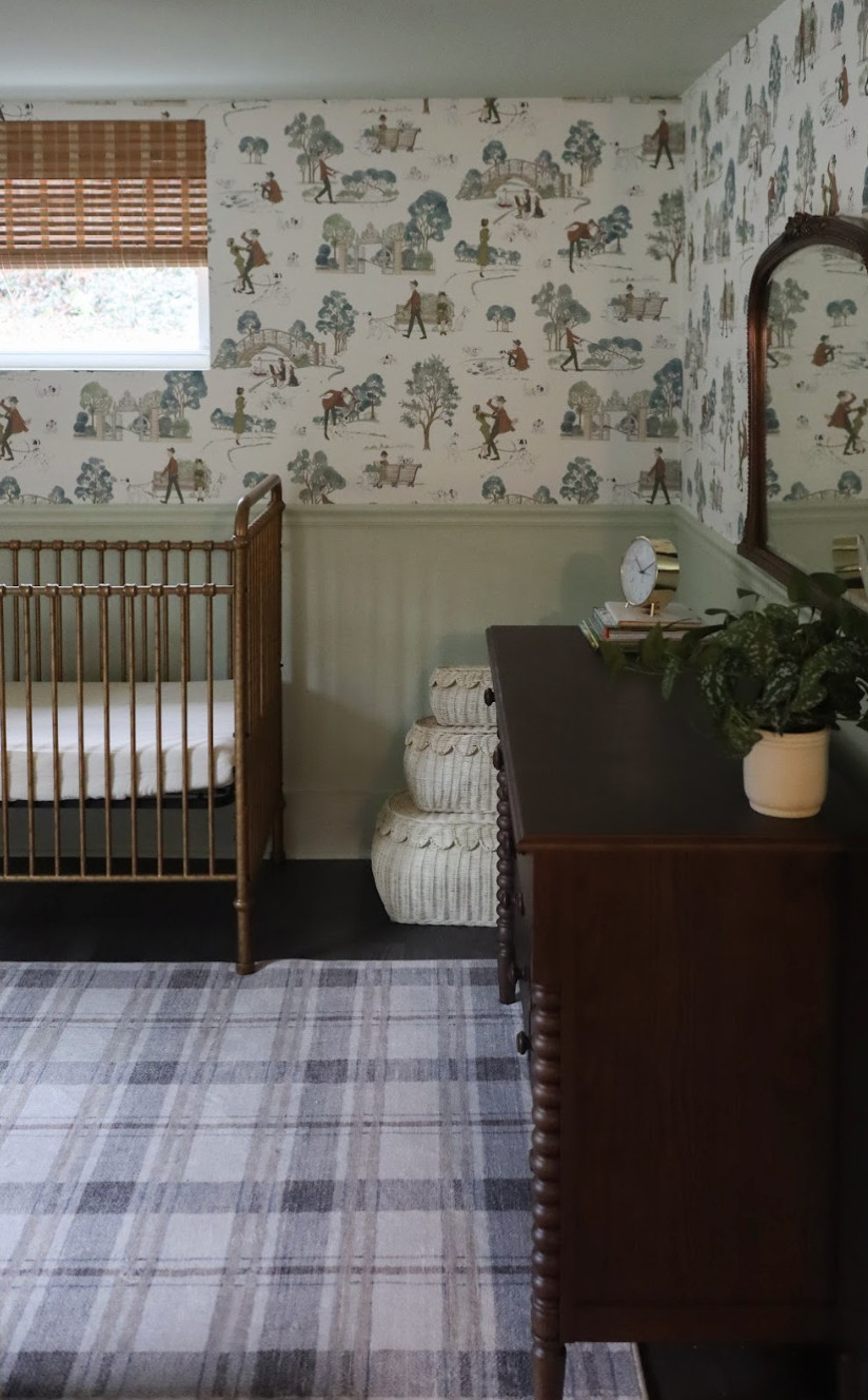 This sage green nursery transformation is proof that even a small space can feel warm, functional, and full of charm.✨ We started with playful 101 Dalmatians wallpaper and layered in vintage furnishings, cozy textures, and timeless details to create a nursery that feels both classic and personal. Because the room was on the smaller side, we were intentional with every choice — a vintage-style armoire for hidden storage, low bookshelves for easy access, and a boucle rocking chair for those late-night snuggles. The result is a cozy, traditional-inspired space with a touch of eclectic whimsy — perfect for a little boy to grow into.🐾💚 

 #nurserydesign #traditionalstyle #eclectichome #LTKHome #LTKBaby #LTKFamily