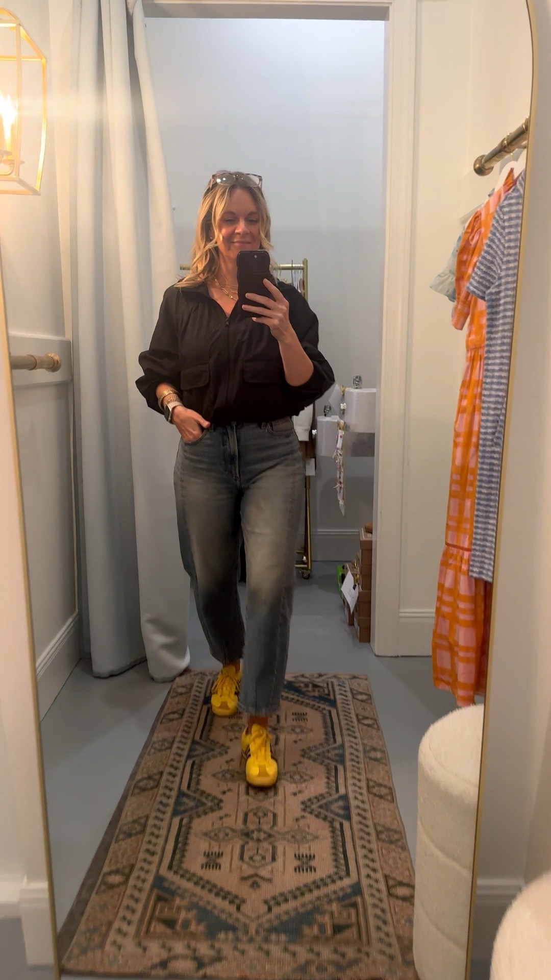 OOTD while setting up a dressing room for a client appointment 🙋‍♀️ Black windbreaker + barrel leg jeans + yellow Adidas — all from my own closet. Linked the exact pieces where I can and the closest versions where I can’t. Everything shoppable below! 👇

#LTKOver40 #LTKootd #LTKdayinmylife