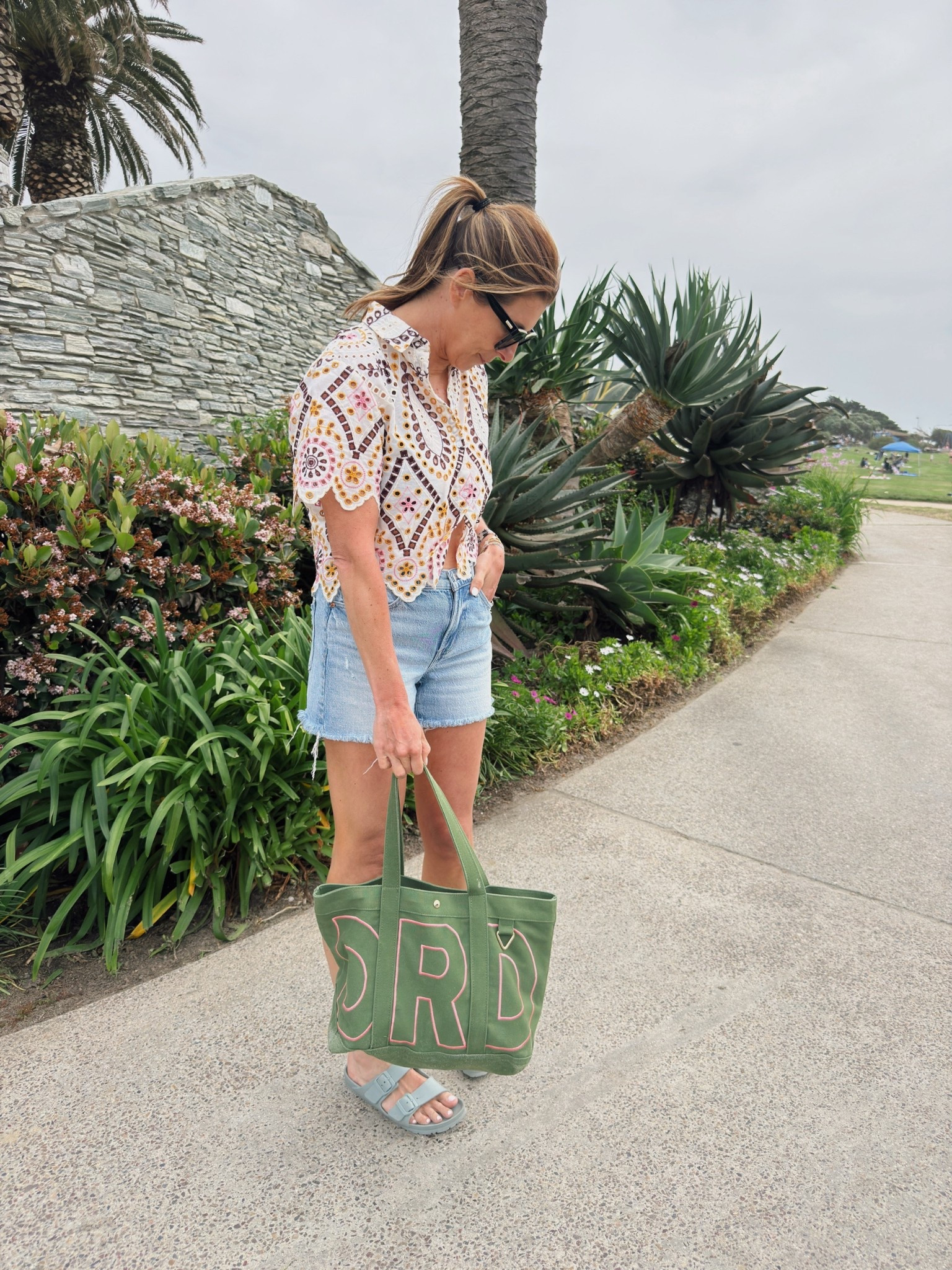 Colorful eyelet top for summer. Monogrammed tote bag for morther’s day. 

#LTKdayinmylife #LTKootd #LTKOver40