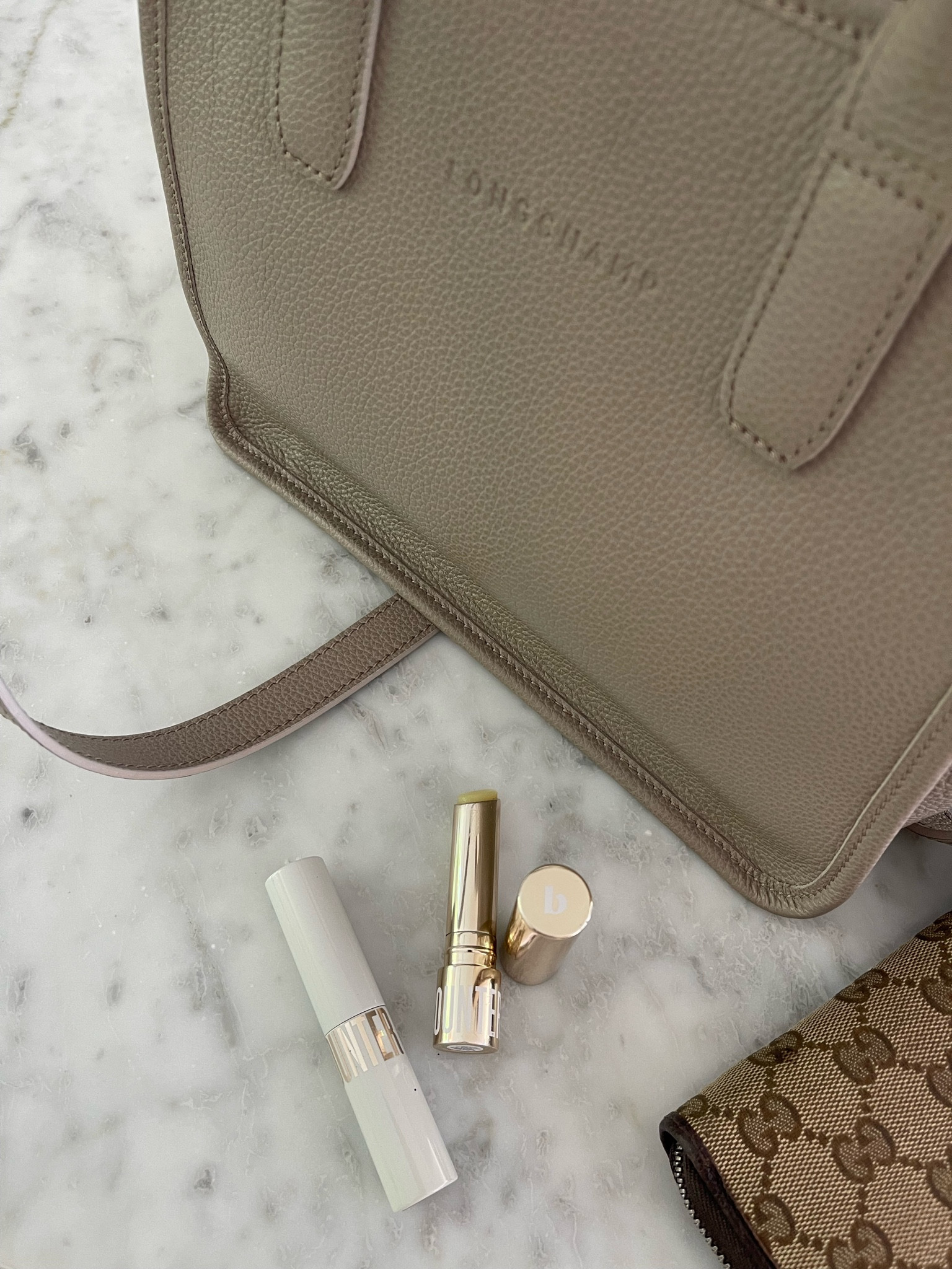 capsule purse in that beautiful ‘mushroom’ color, pebbled detail, crossbody for on the go.

#LTKworkwear #LTKMostLoved #LTKstyletip