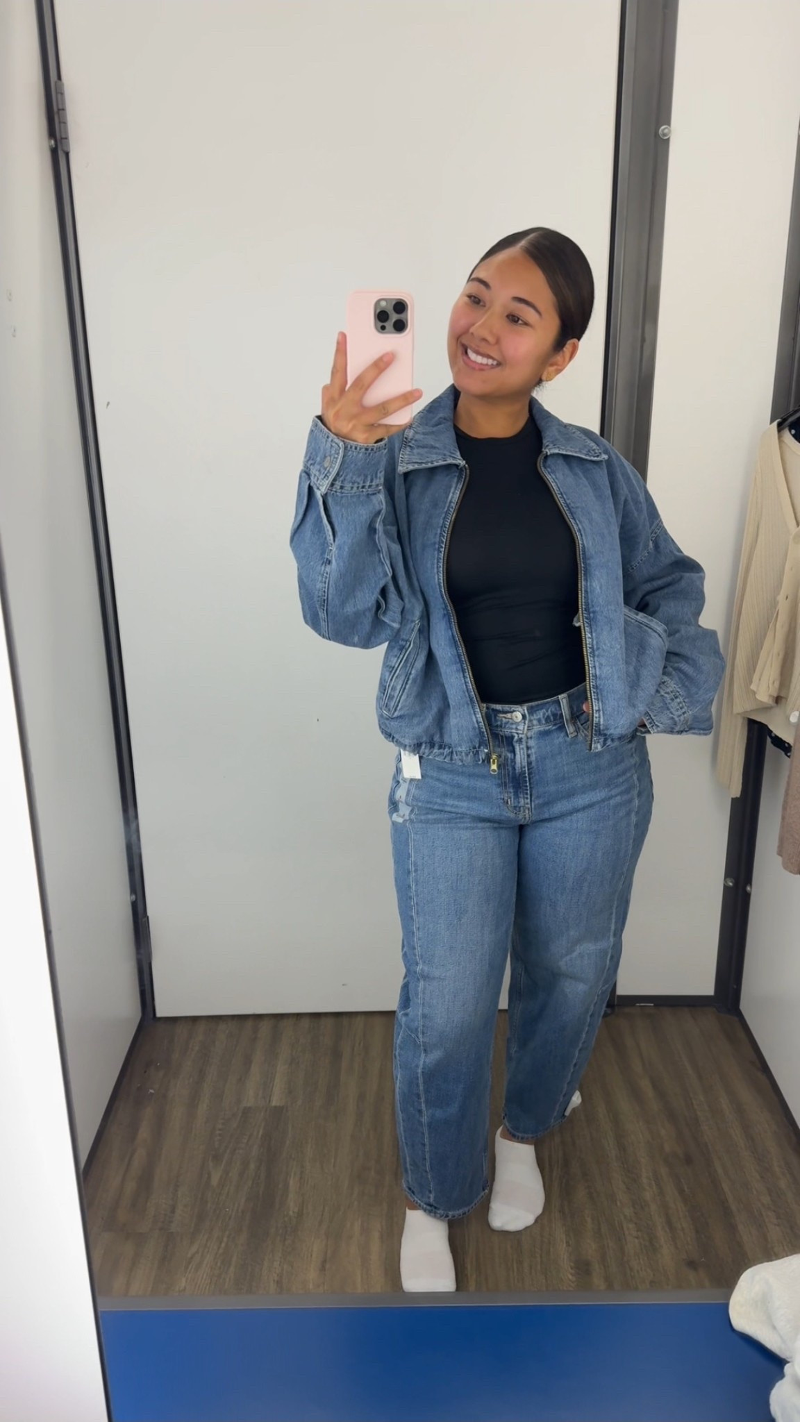 Wearing size Large for jacket and size 8 for jeans 