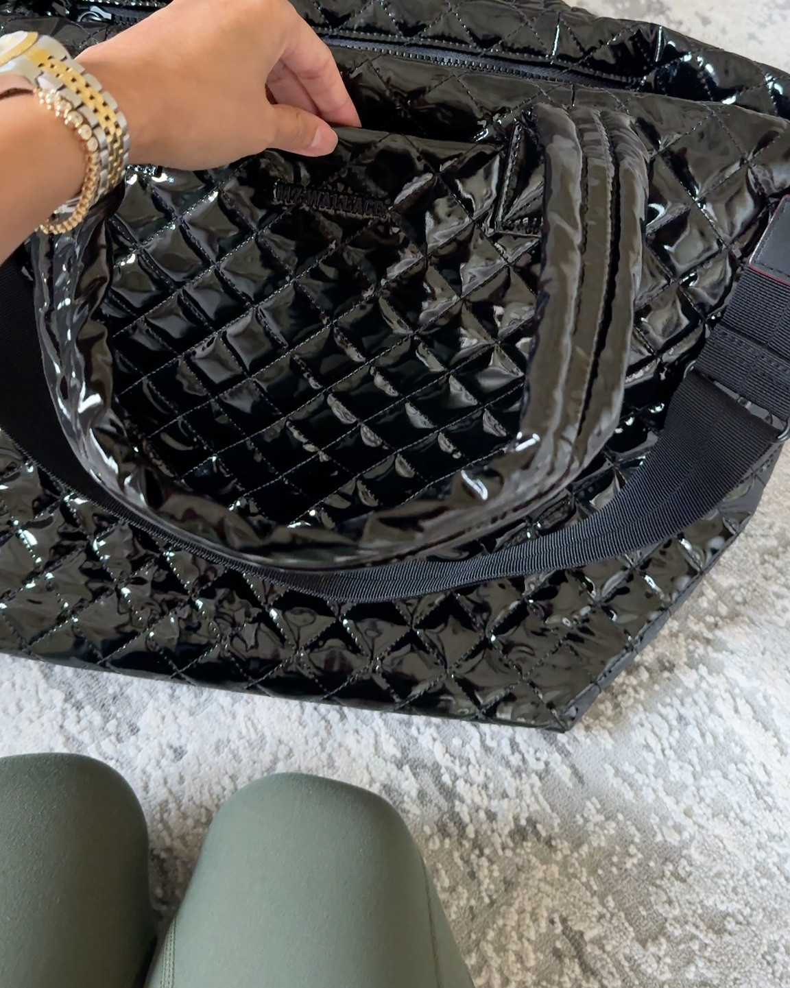 She’s back. This gorgeous tote bag is done in the coveted black lacquer finish.  It makes a great casual or work tote. I use it mostly as a travel bag. Lightweight, functional, and well-designed organizational details. Modern classic style that works well with athleisure outfits too. Other styles also available in this eye catching finish. The black lacquer is not always available, so if you have been eyeing this look now is the time. 
Fall bag. Fall handbags. 



#LTKOver40 #LTKTravel #LTKItBag