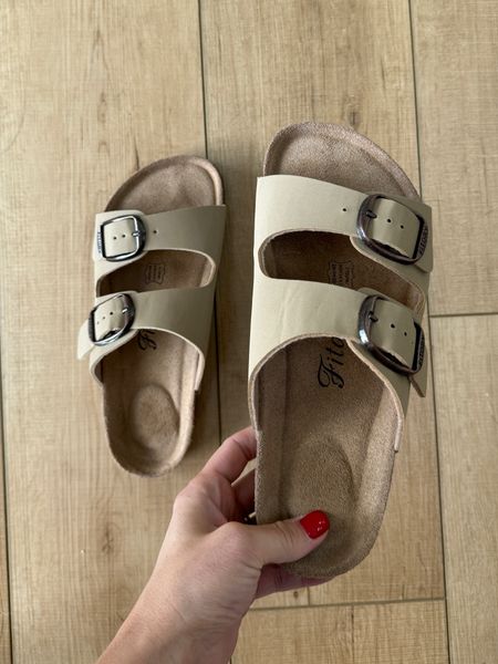 These adjustable sandals are SUCH a good look for less. They’re comfortable and fit true to size, but if you have to go up to the next size that works, too. I’m a 7.5 and went to the 8 and they’re great. They have a molded footbed and cork bottom, and they come in a bunch of great neutral colors. Highly recommend. #amazonfashion #springshoes #summersandals 

#LTKfindsunder50 #LTKsalealert #LTKshoecrush