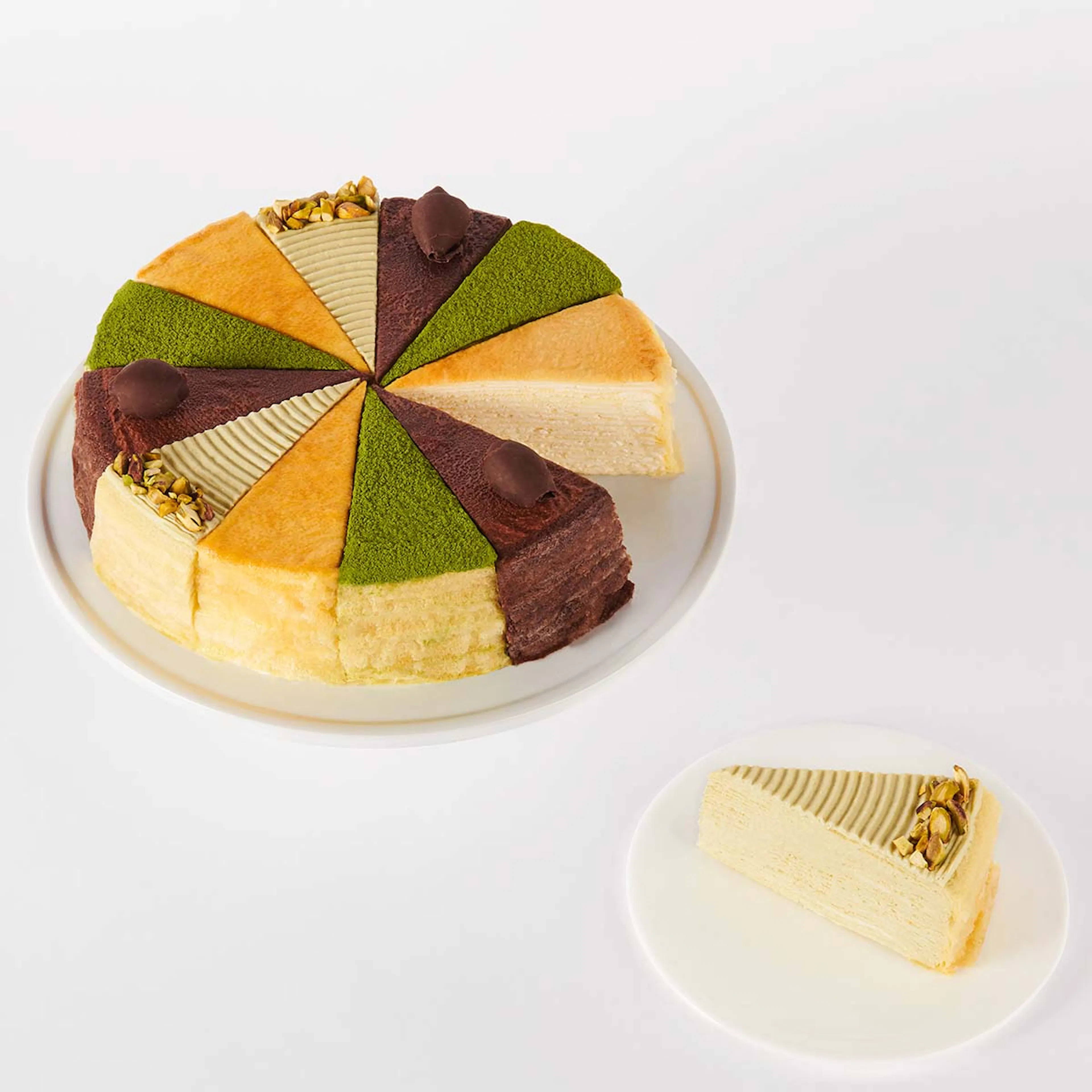 Slice of the Best Mille Crêpes Cake: Celebration Collection by Lady M Confections | Goldbelly | Goldbelly