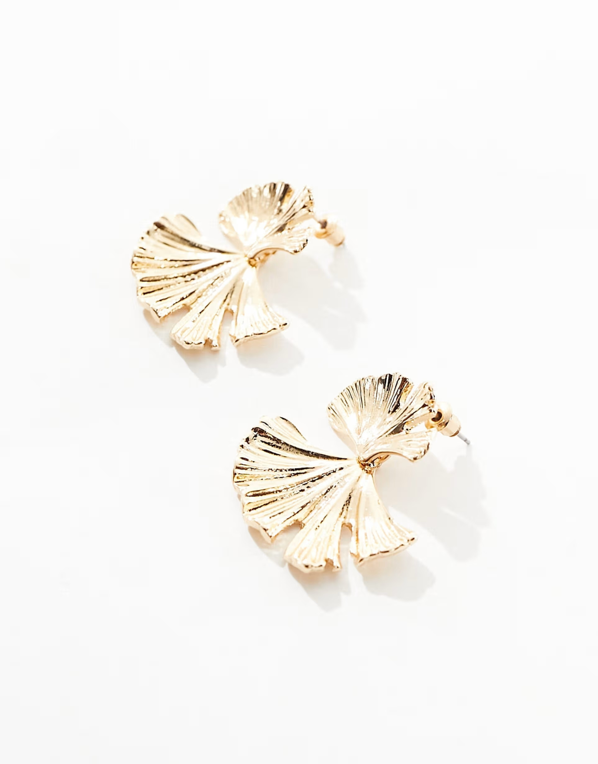 ASOS DESIGN drop earrings with textured leaf design in gold tone | ASOS (Global)