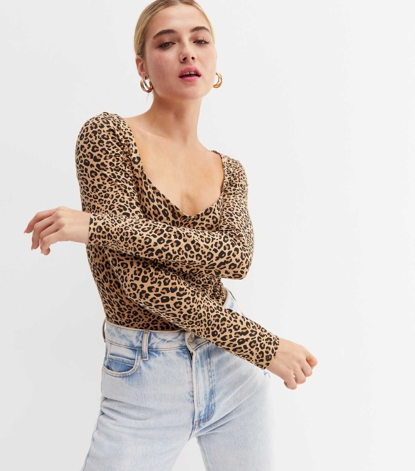 Brown Leopard Print Scoop Neck Long Sleeve Bodysuit
						
						Add to Saved Items
						Remove ... | New Look (UK)