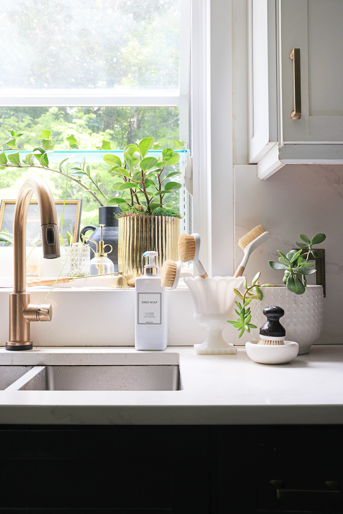 Keep the kitchen sink area cute and tidy with stylish cleaning tools, attractive soap dispensers, and dishes to hold sink sponges and brushes | Kitchen sink area 

 #LTKHome
