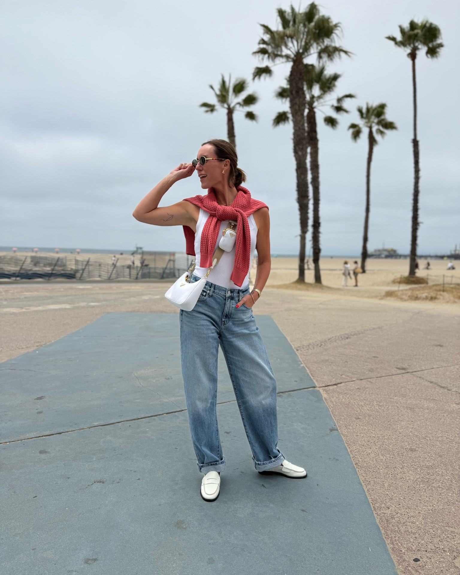 Summer outfit formula: white ribbed tank, relaxed light wash jeans, pop of color sweater over shoulders. Polished off with white loafers and crossbody purse. And of course the sunnies 😎 summer look, summer style, Cali style, summer denim, chic style, simple style.

#LTKSeasonal #LTKOver40 #LTKTravel