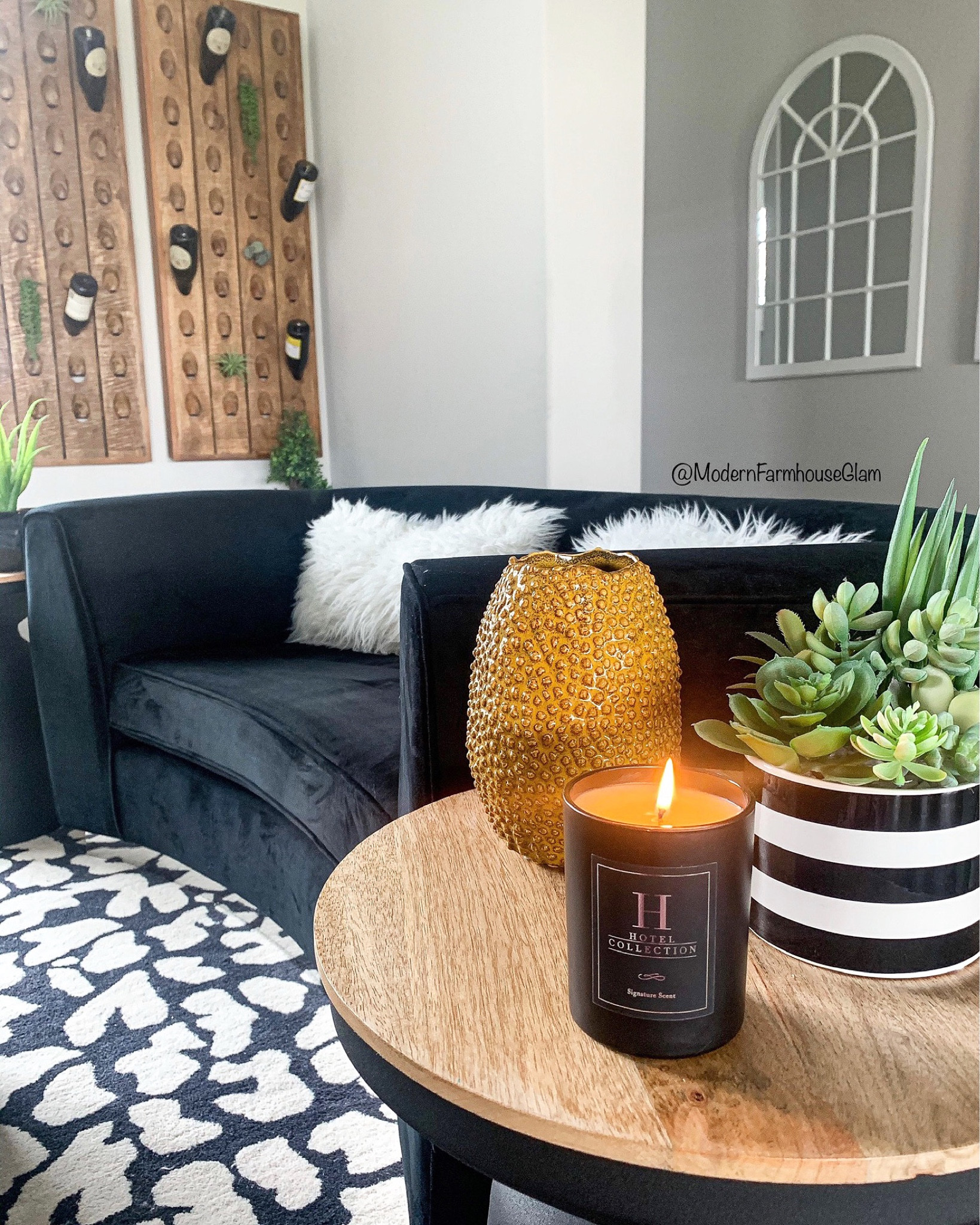 Black velvet loveseat, cheetah rug, wooden wine holder and black candle in my Barrel Room at Modern Farmhouse Glam 

#LTKhome #LTKsalealert