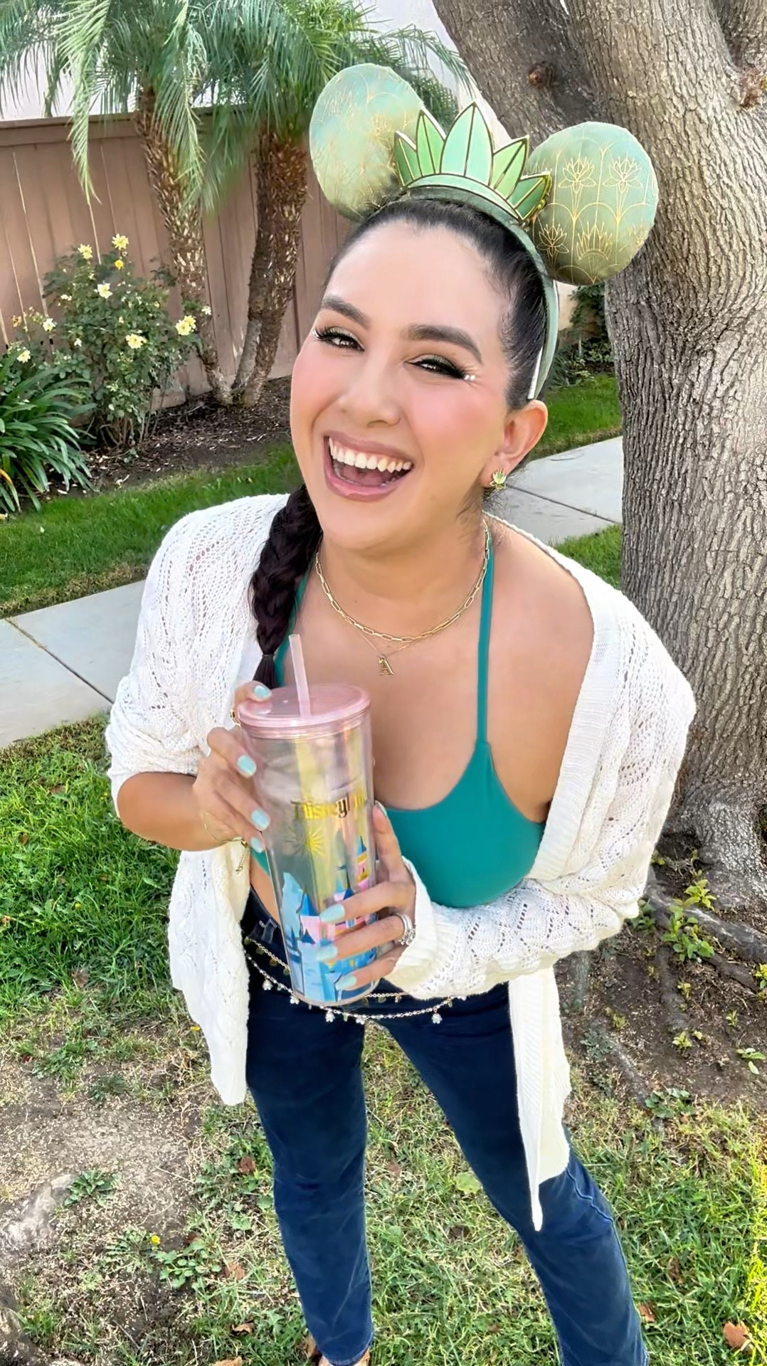 Treat yourself like the Disney princess you are with this Tiana inspired Disney bound ✨🐸💚☺️

I linked the entire set of the Disney parks jewelry I found for Tiana which includes the Tiana earrings, Tiana necklace & Tiana bracelet. These sold out quick inside the parks so if you’ve been eyeing this one grab it while you can.

It makes a perfect holiday gift too for any Disney fan who loves Tiana 🥰

The top is actually active wear and I wear this sports bra ro the gym & casually. It has padding so you can wear a bra or not underneath. It’s extremely comfortable 😍 

I always like to carry some type of tumbler with me to drink water & when it’s a Disney tumbler it just adds that extra magic into my day. This one is for for a princess for sure 🏰

I added little gems to this makeup look for a princess theme & all I use is lash glue to keep it on. My foundation, pressed powder, eyeshadow, blush & lip gloss is all linked for you here + the lashes & press on nails.

Unfortunately they are out of stock on this color which is 508 but I linked other colors for you 😊

I like to take wear different Disney bags to express myself & this one is one of my top favorites because it’s Mickey Mouse shaped & I can personalize it with Disney pins 😍 

I own so many beautiful Disney jewelry pieces that I rotate with my outfits. So I linked a few of them here for you too 🐭

Still shopping for a Disney Princess fit? But for a different Princess? Lmk what you’re looking for so I can give you some options 🫶🏼

#LTKVideo #LTKBeauty #LTKGiftGuide