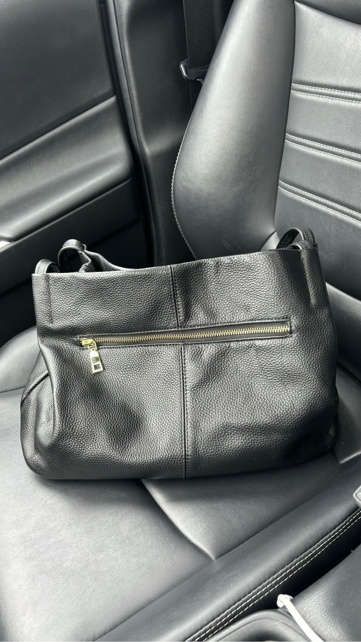 I bought this bag because I needed something to fit my large A6 wallet and let me tell you I have fallen in love with this bag. The leather is beautiful and the pockets are so functional! It’s thee perfect size. Not too big and not too small I can always find what I’m looking for which is important! It comes in different colors and I’m definitely considering purchasing another one because I love this bag so much! 

I have the medium size and it also comes in large! 

#LTKWorkwear #LTKItBag #LTKFindsUnder100