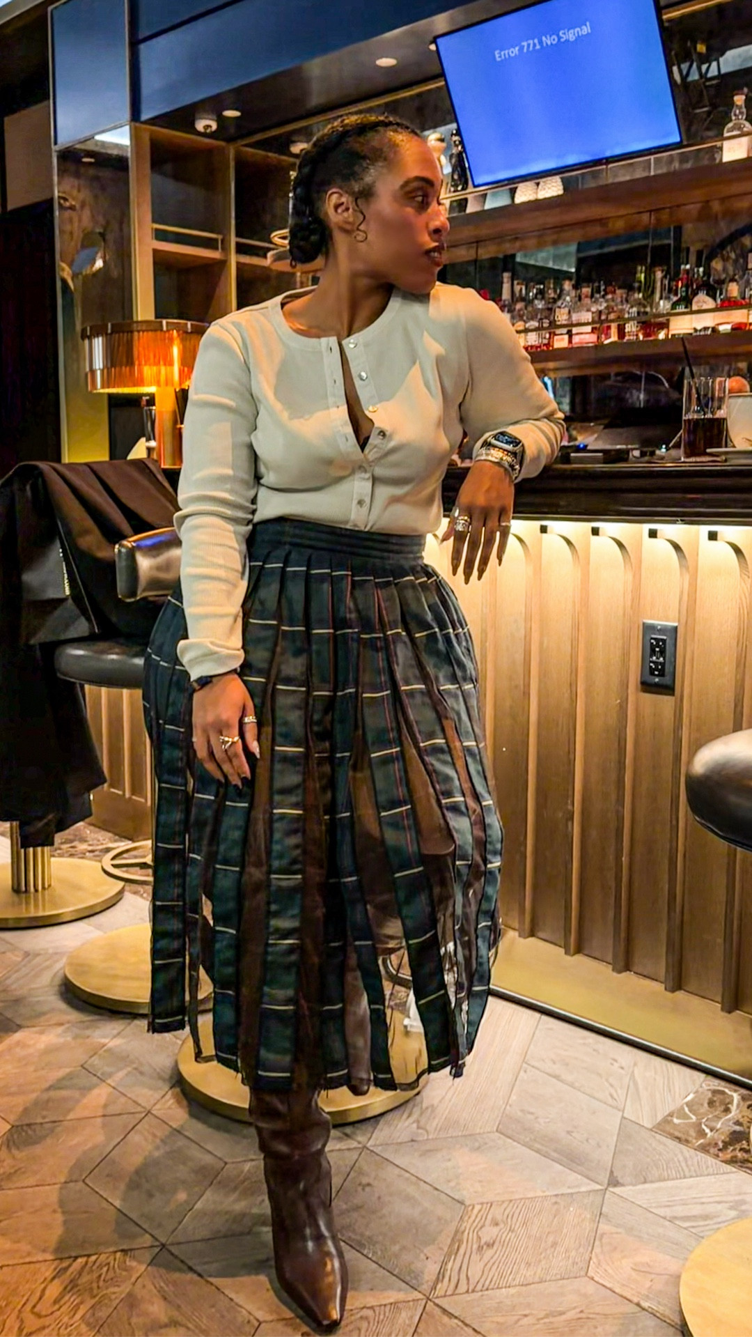 Theater night look 🎭
A @Madewell cardigan layered over an @Anthropologie plaid sheer pleated skirt, styled with brown Vince Camuto boots and a brown Coach bag. 

#LTKootd #LTKdayinmylife #LTKgrwm