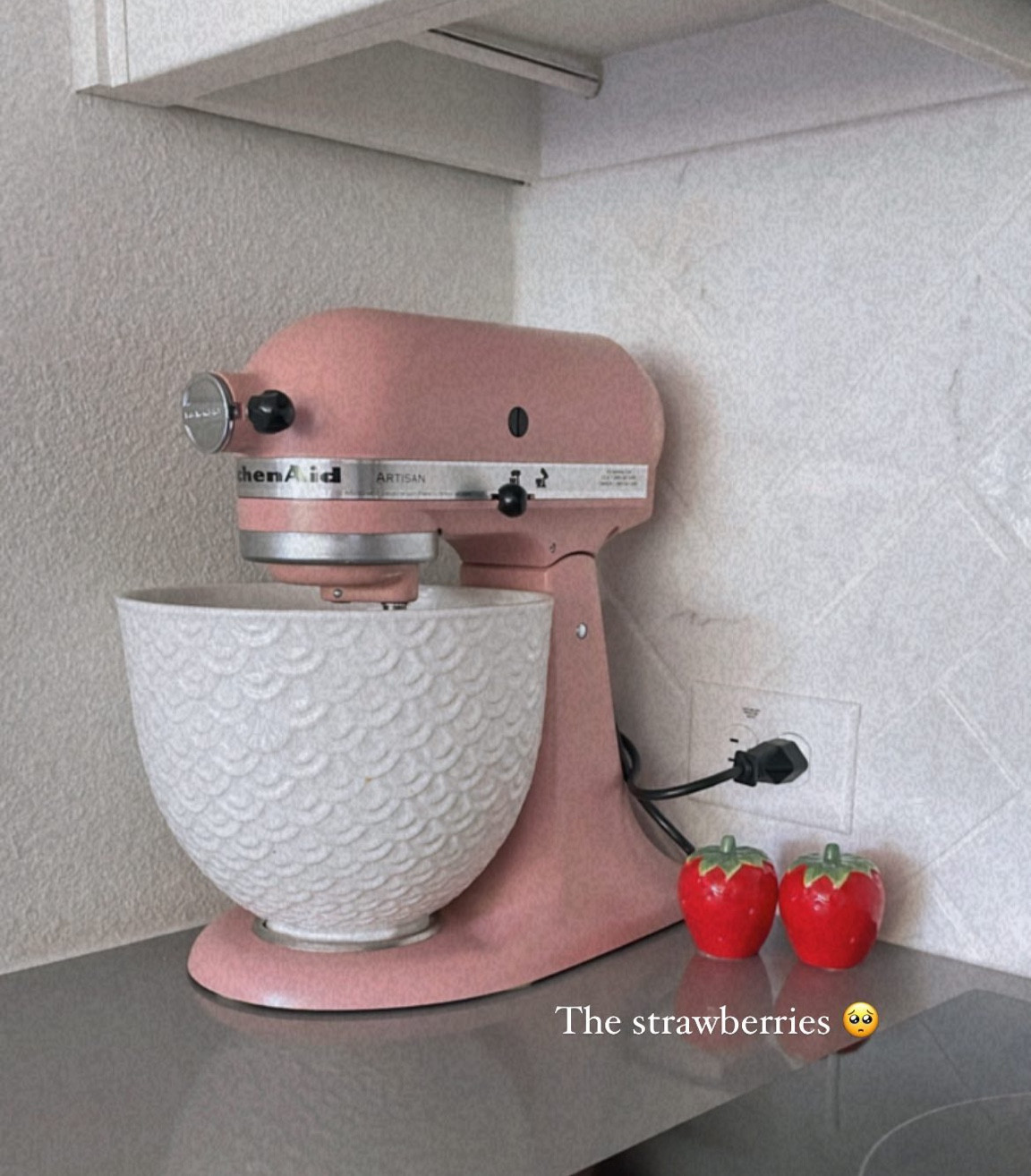 One of my favorite corners in my new kitchen 😍 The pink kitchen aid + the new bowl and my strawberry salt and pepper shakers omg #kitchenaid #kitchen #saltandpepper

#LTKhome #LTKFind
