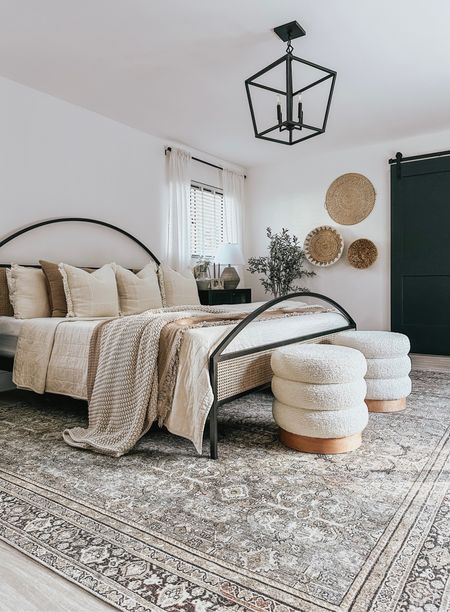 Modern organic bedroom #bedroom #bedding #bed #rug #sidetable #pouf #curtains #homedecor #neutralhomedecor #bedroomdecor #throw #archbed #canebed 

#LTKsalealert #LTKFind #LTKhome