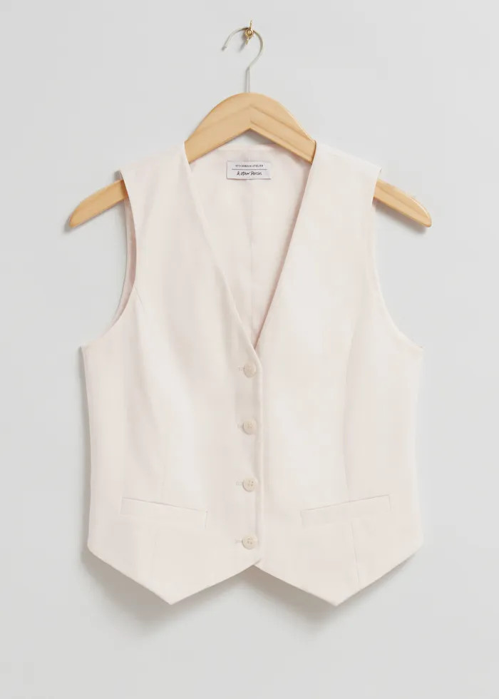 DESIGNED IN STOCKHOLM
      Button Down Vest
      
         
			$79
	

		

      
      
      
... | & Other Stories US