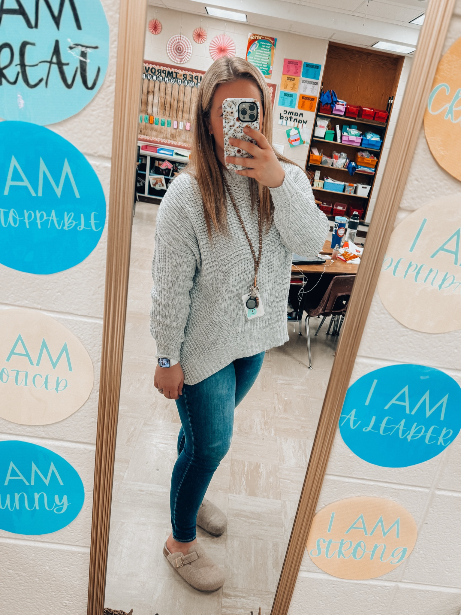 Cute casual teacher outfit - soft knit sweater for winter - high rise medium wash denim jeans - fuzzy slip on buckle clogs 

#LTKMidsize #LTKFindsUnder50 #LTKFindsUnder100